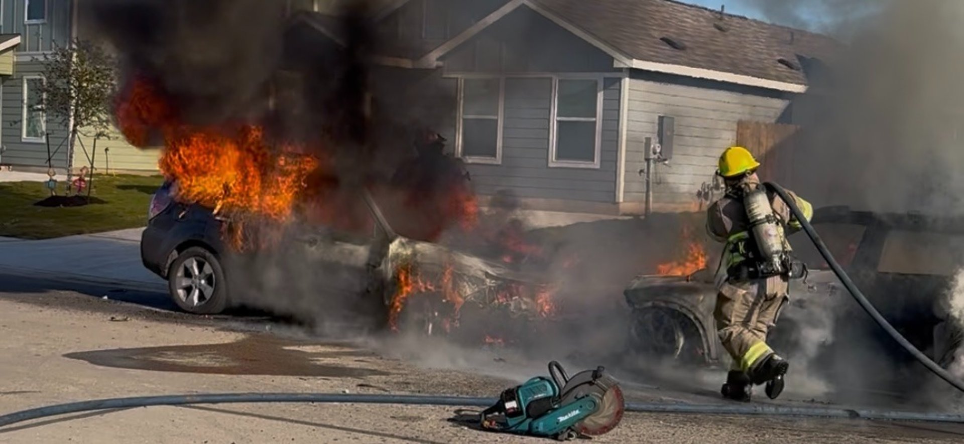 an abstract photo of a curved building with a blue sky in the background