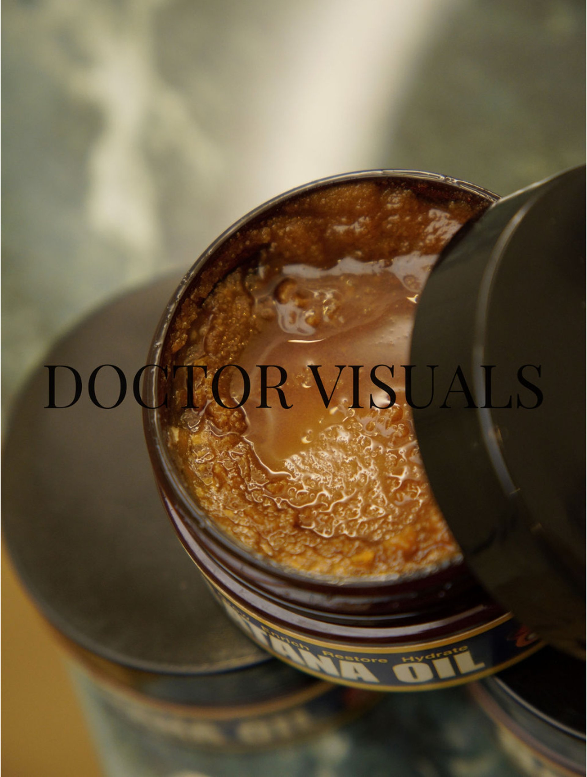 an abstract photo of a curved building with a blue sky in the background