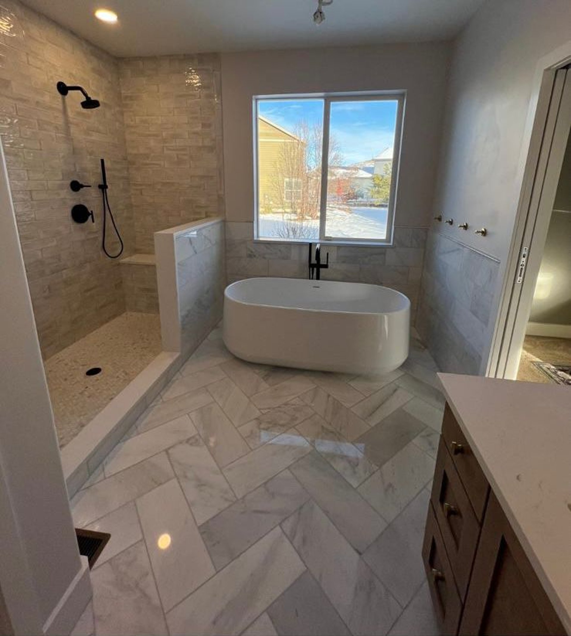 black and brown leather padded tub sofa