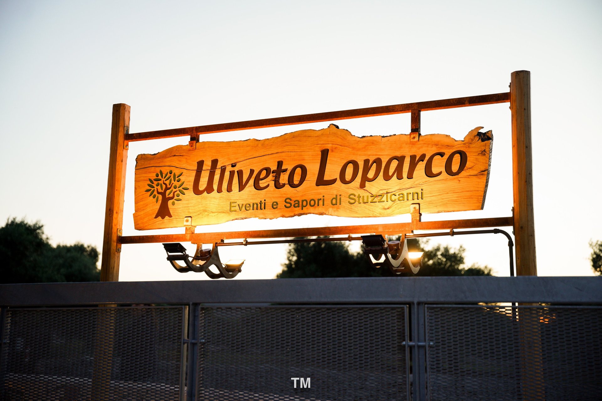 woman wearing yellow long-sleeved dress under white clouds and blue sky during daytime