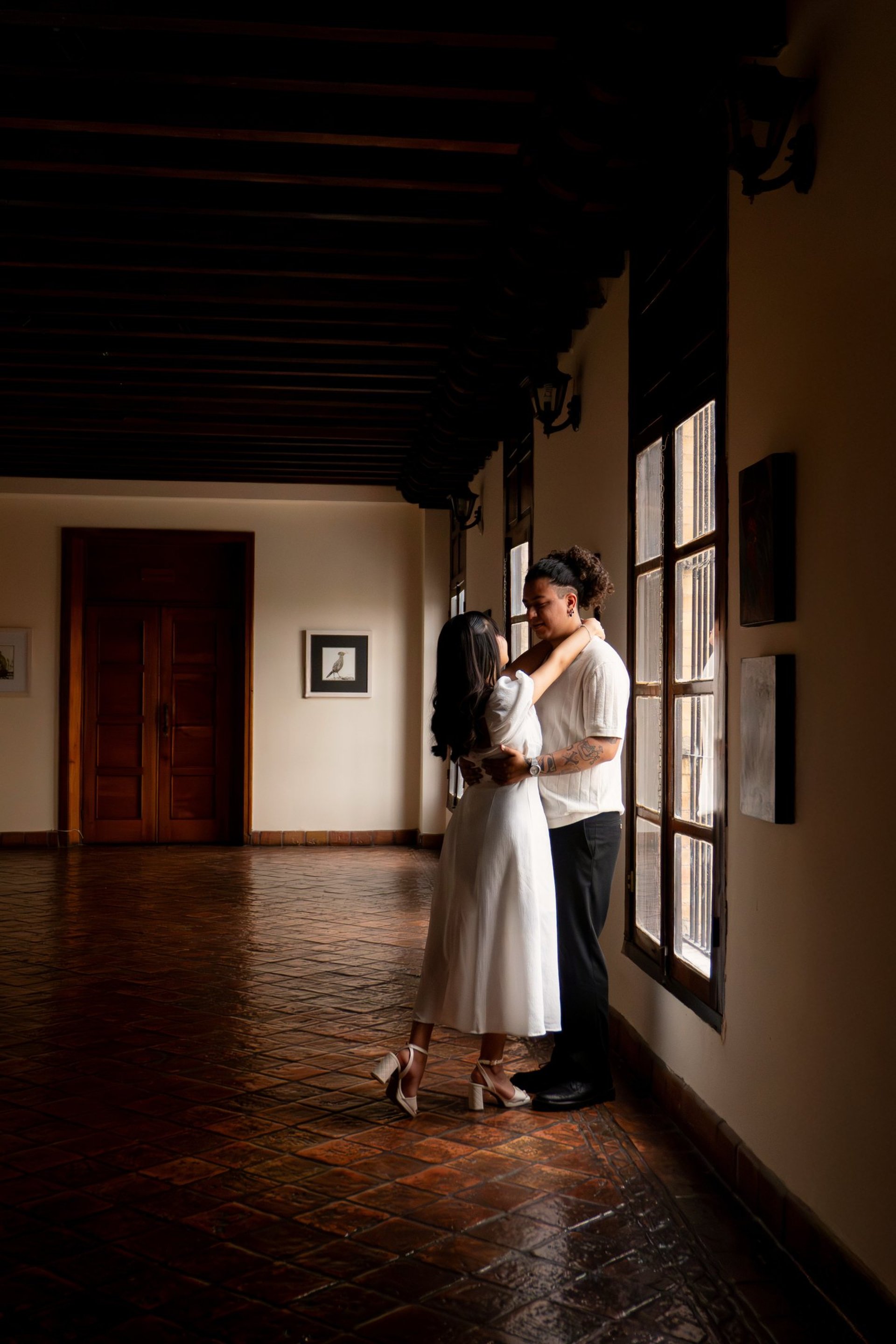 couple wearing silver-colored rings