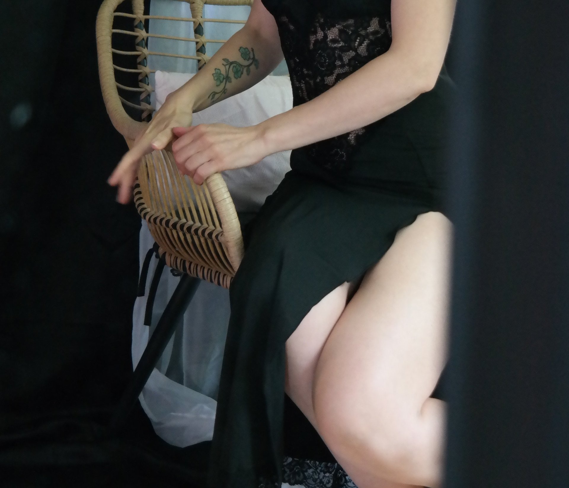 an abstract photo of a curved building with a blue sky in the background