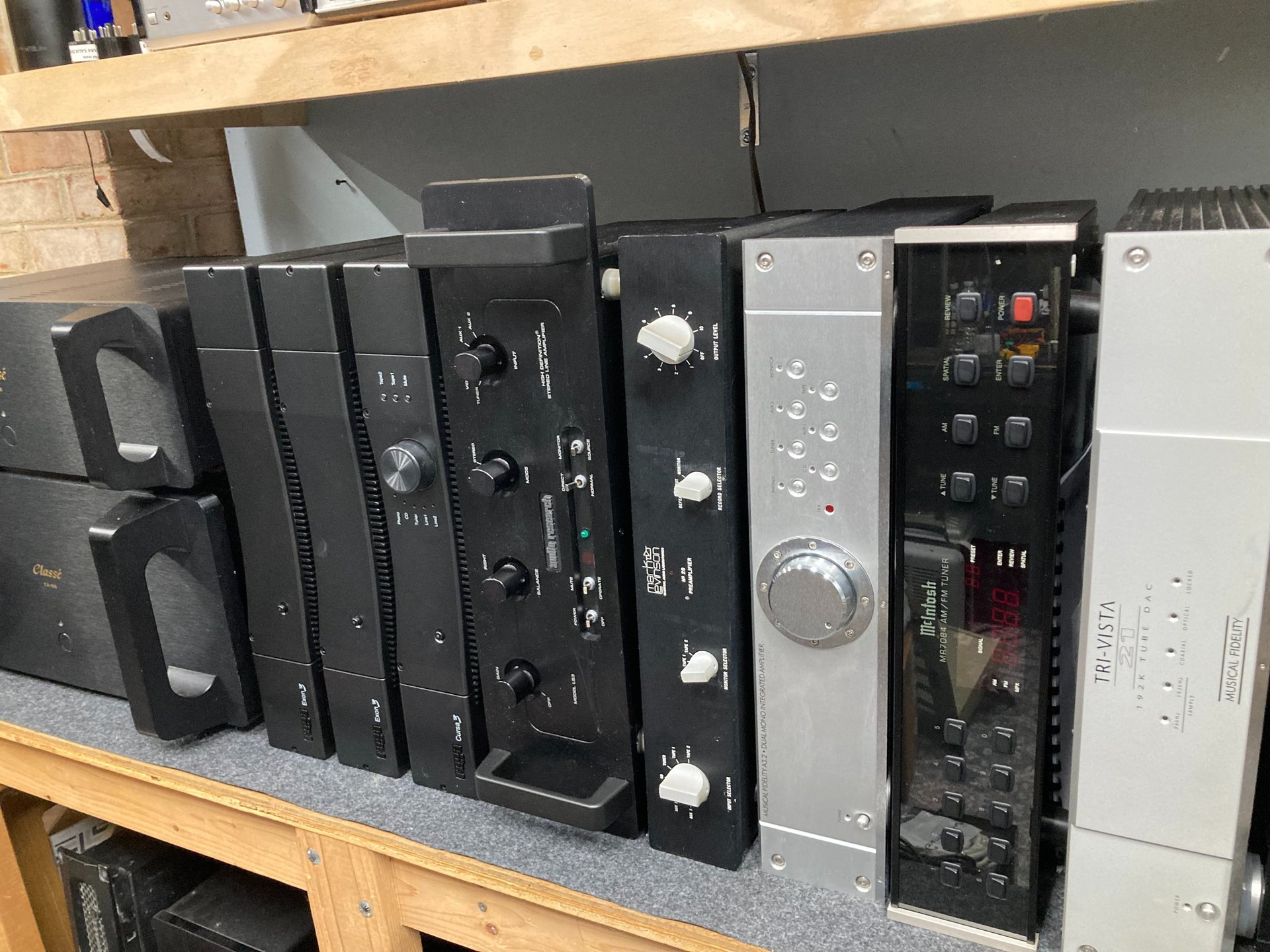 an abstract photo of a curved building with a blue sky in the background