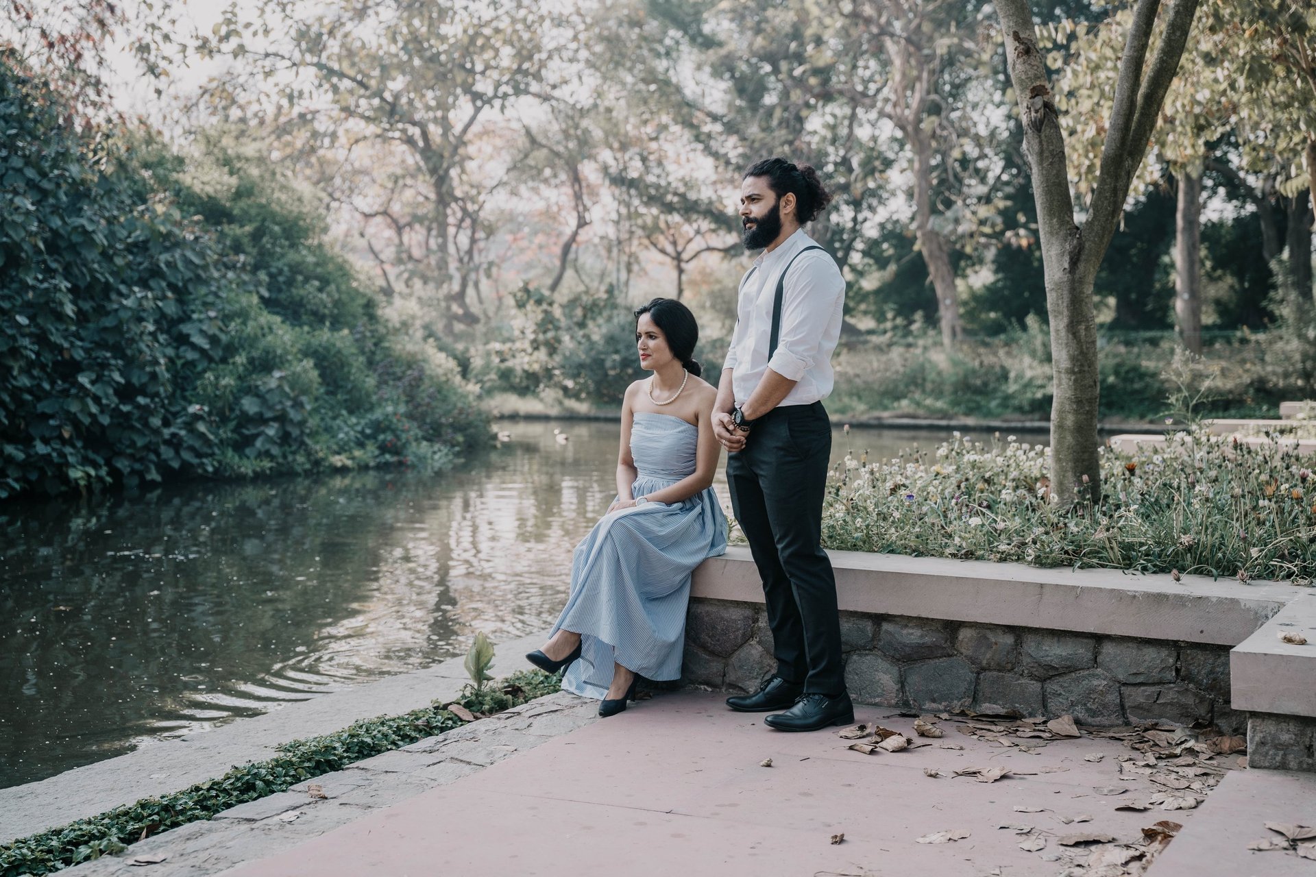 woman wearing yellow long-sleeved dress under white clouds and blue sky during daytime