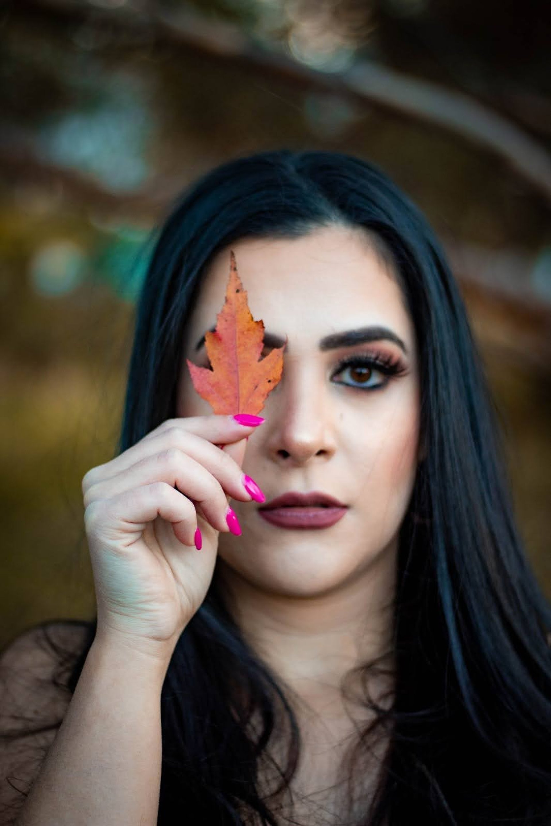 an abstract photo of a curved building with a blue sky in the background