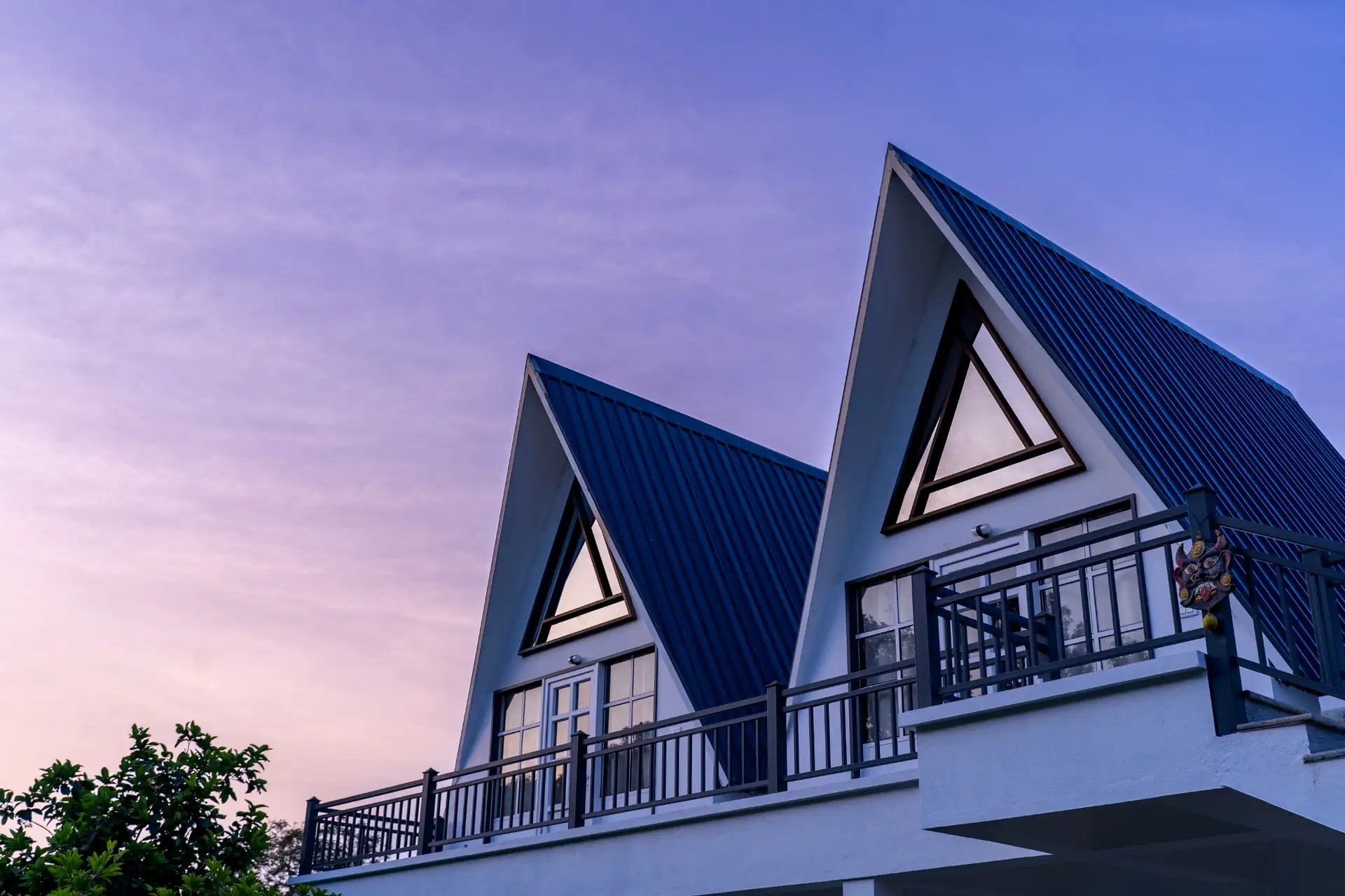 an abstract photo of a curved building with a blue sky in the background