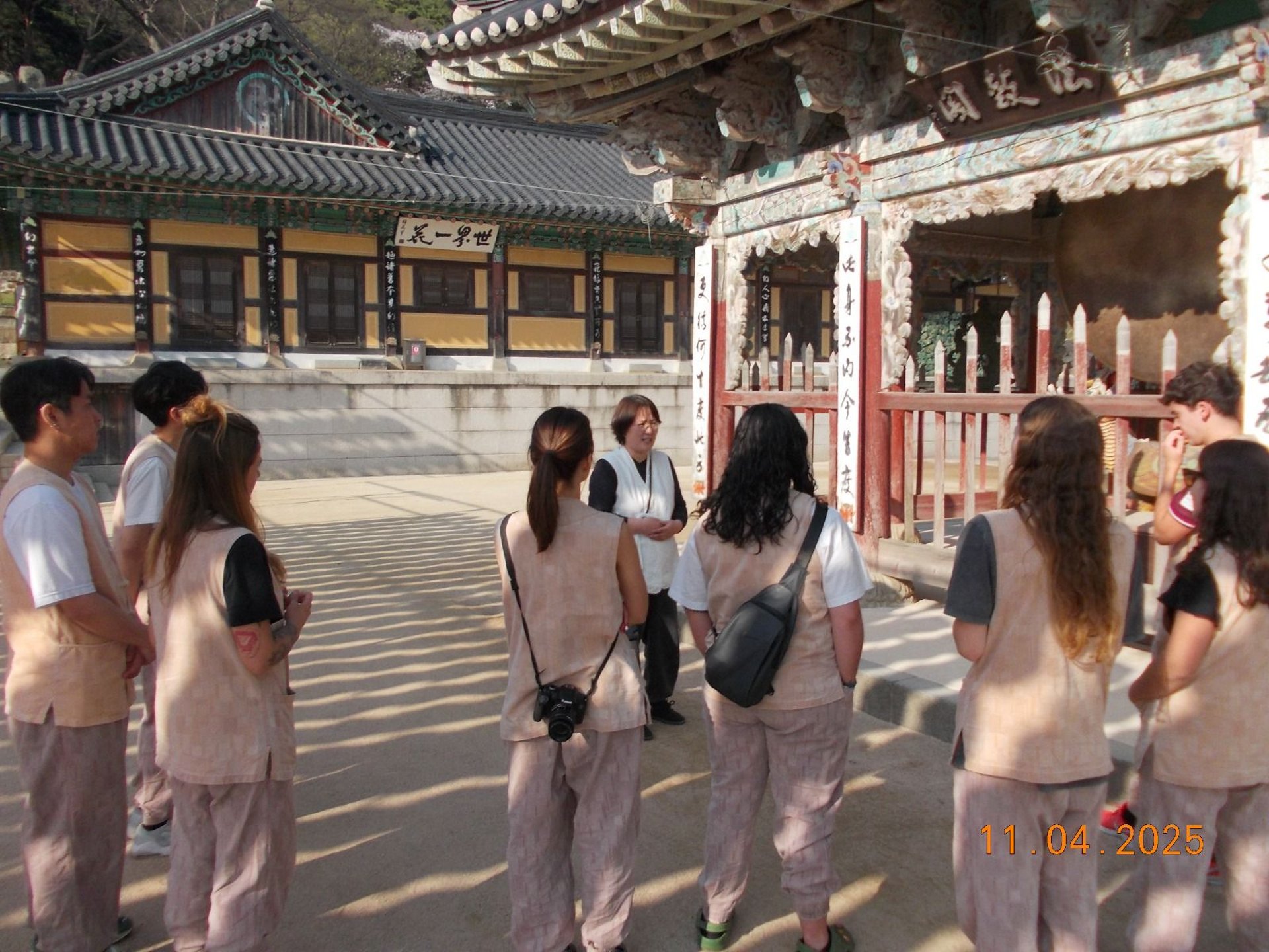 an abstract photo of a curved building with a blue sky in the background