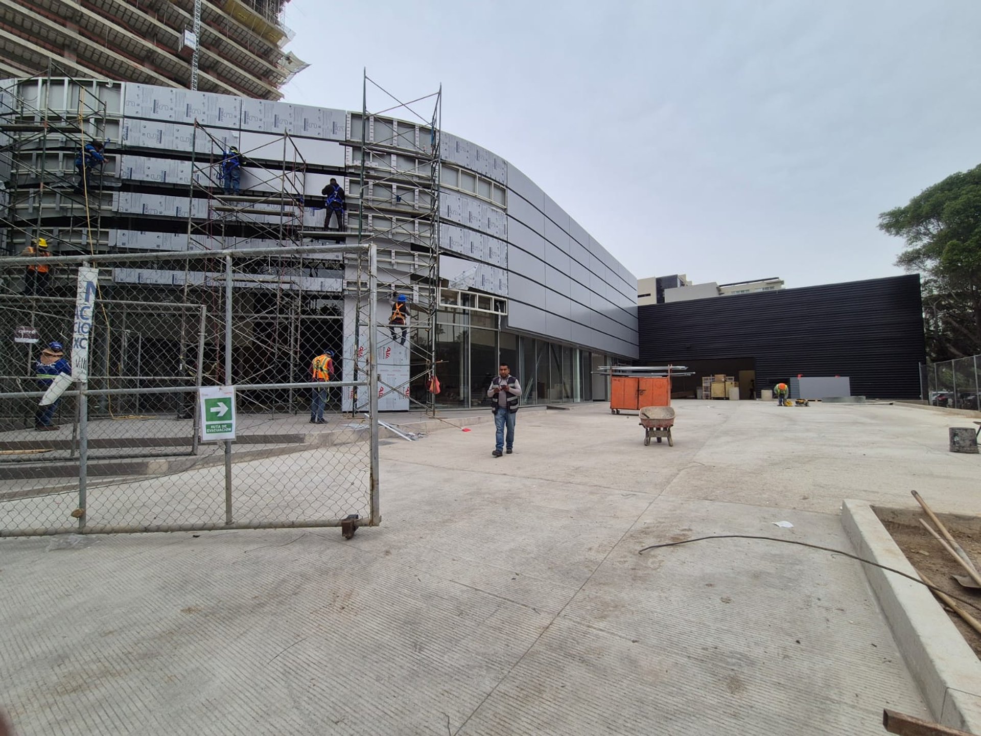black and brown leather padded tub sofa
