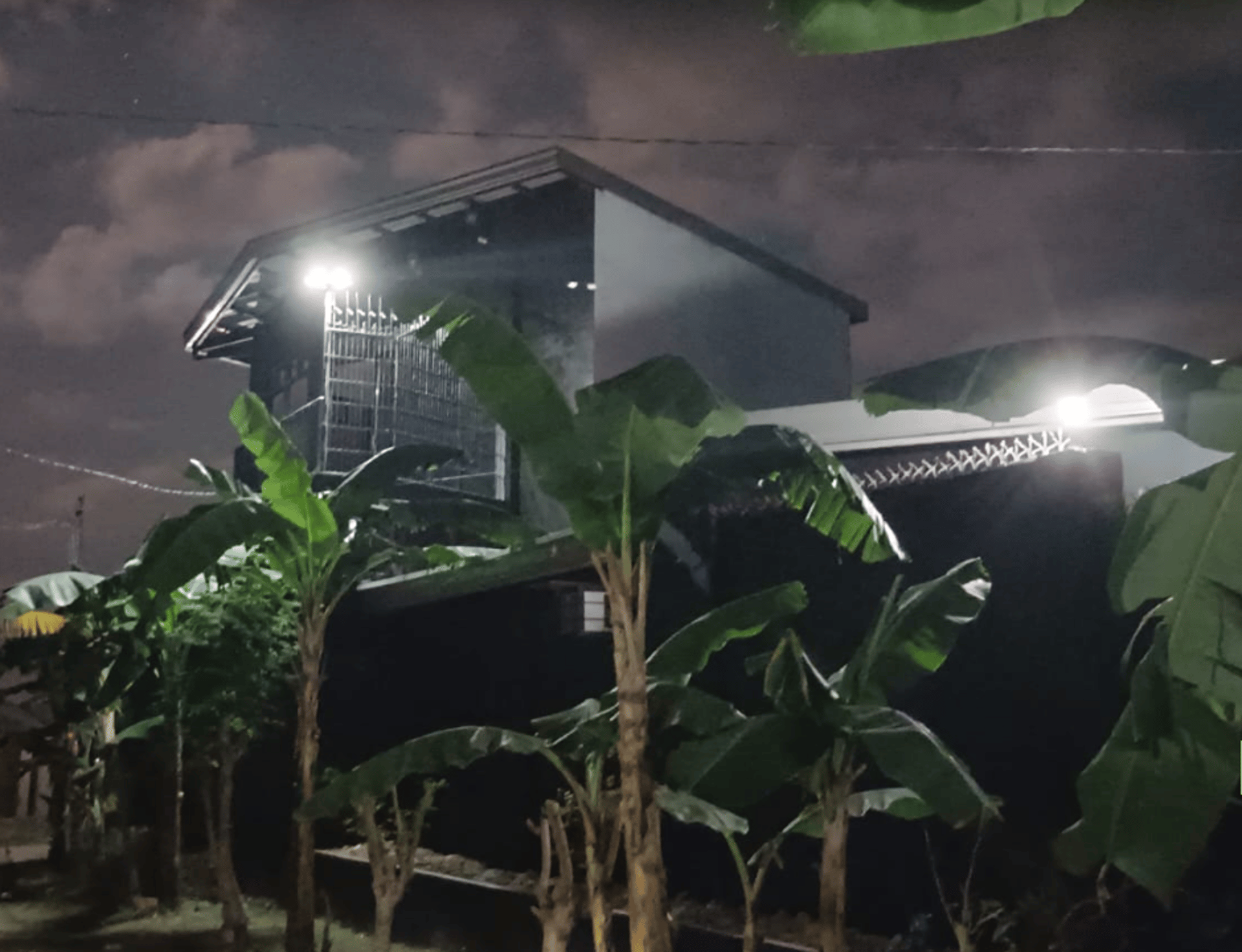 black and brown leather padded tub sofa