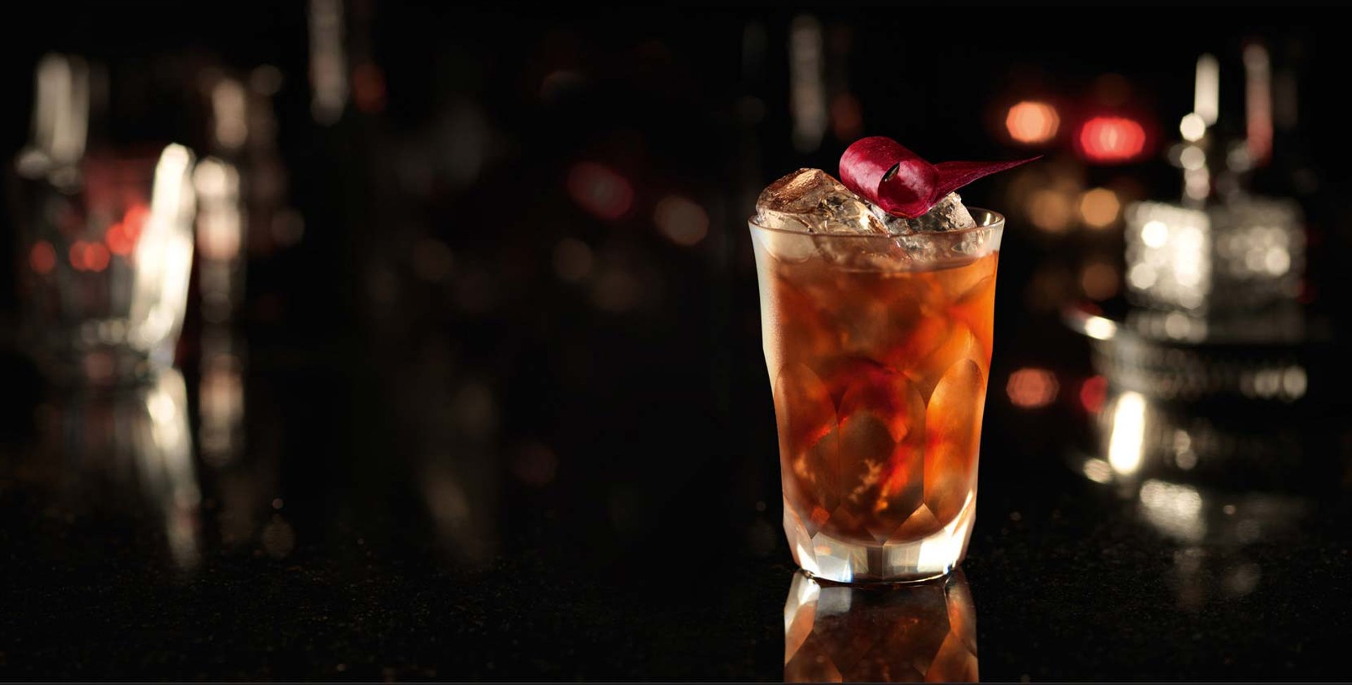 black and brown leather padded tub sofa