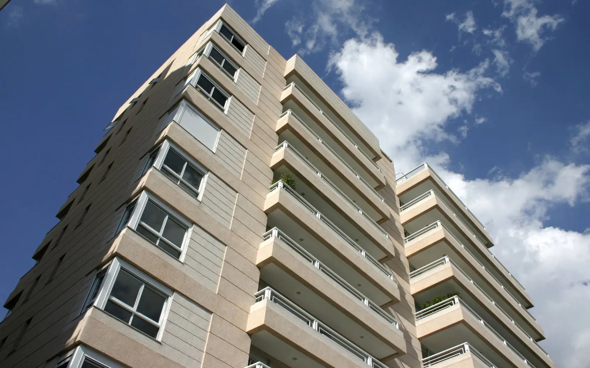 black and brown leather padded tub sofa