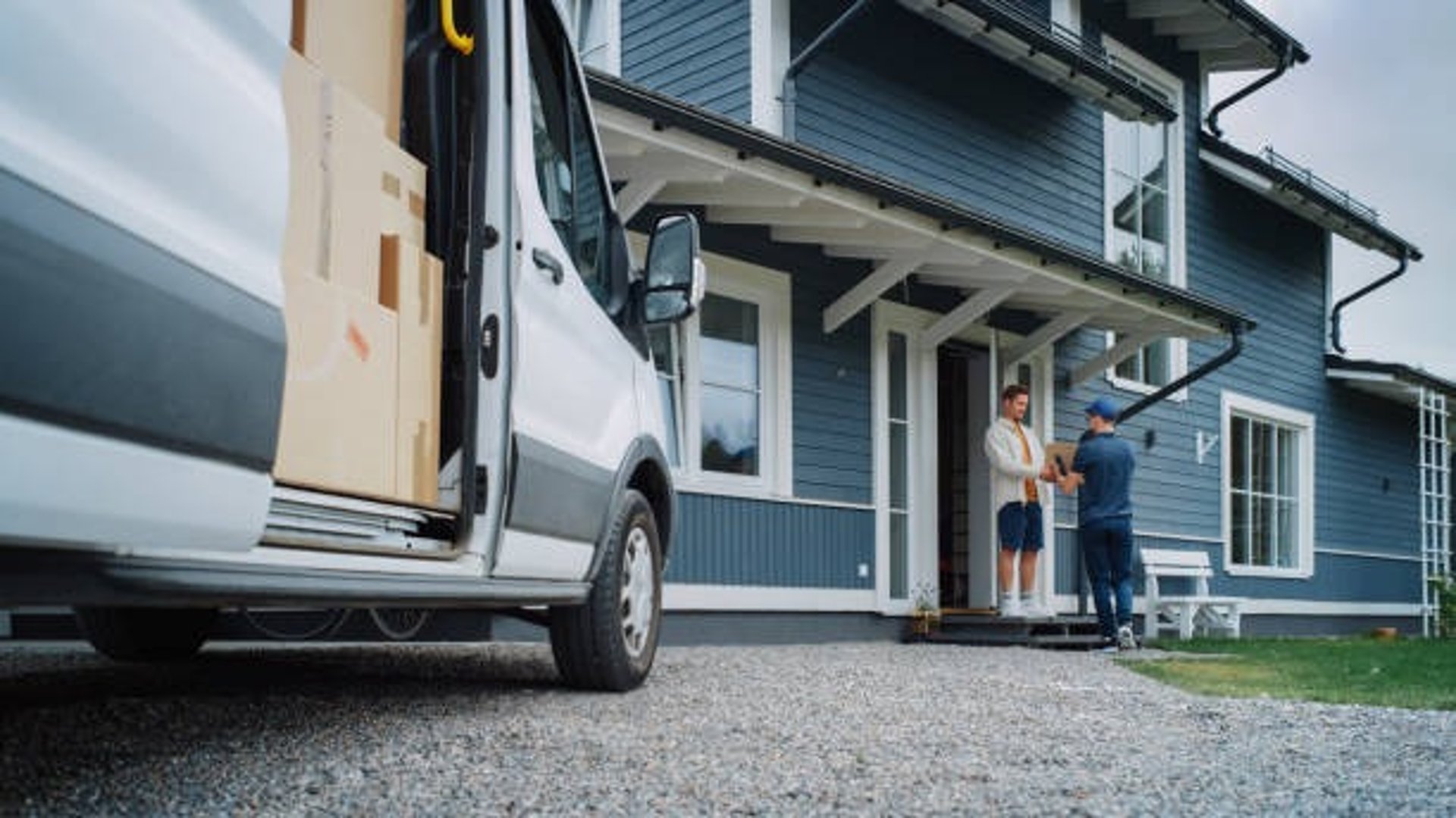 an abstract photo of a curved building with a blue sky in the background