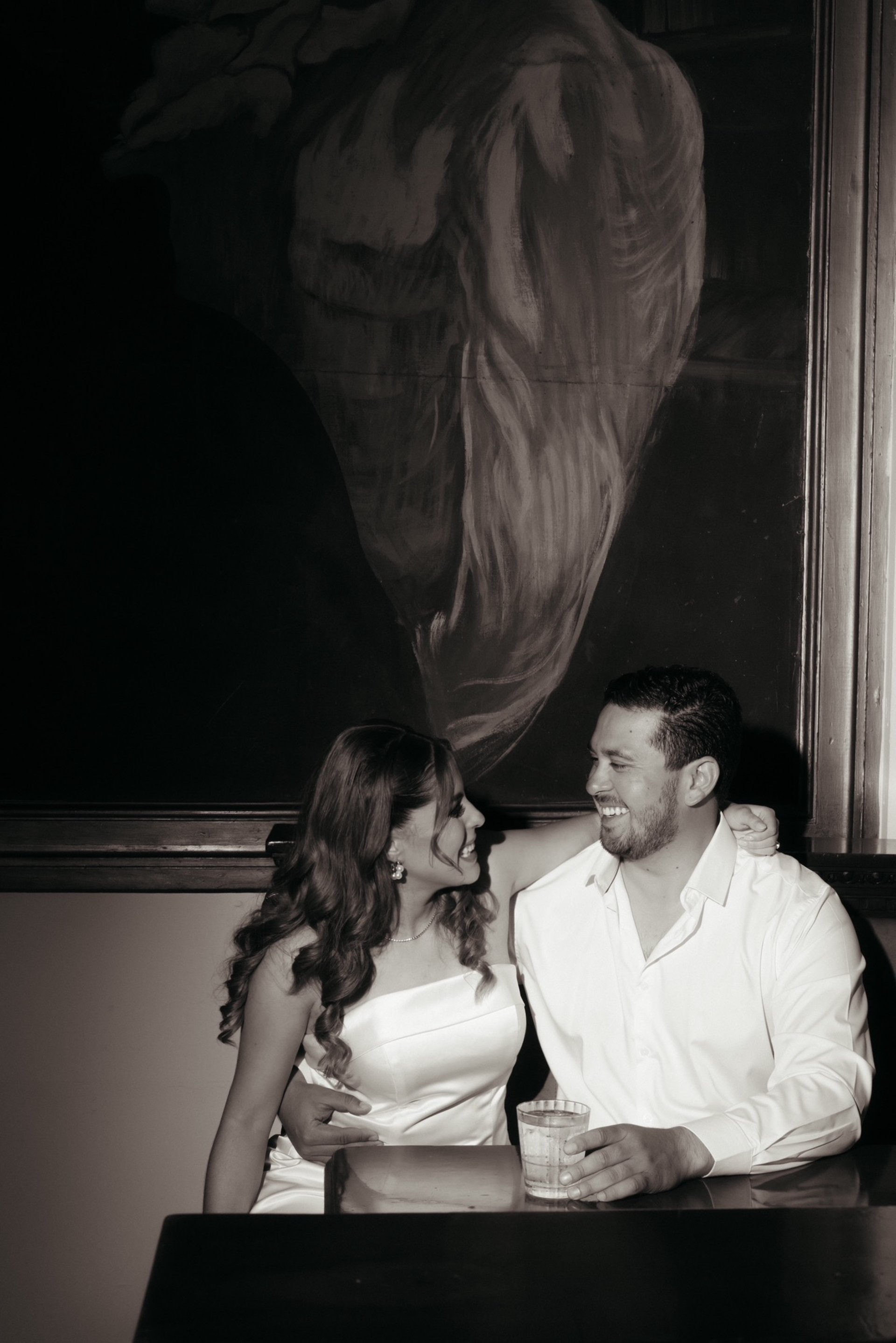 an abstract photo of a curved building with a blue sky in the background
