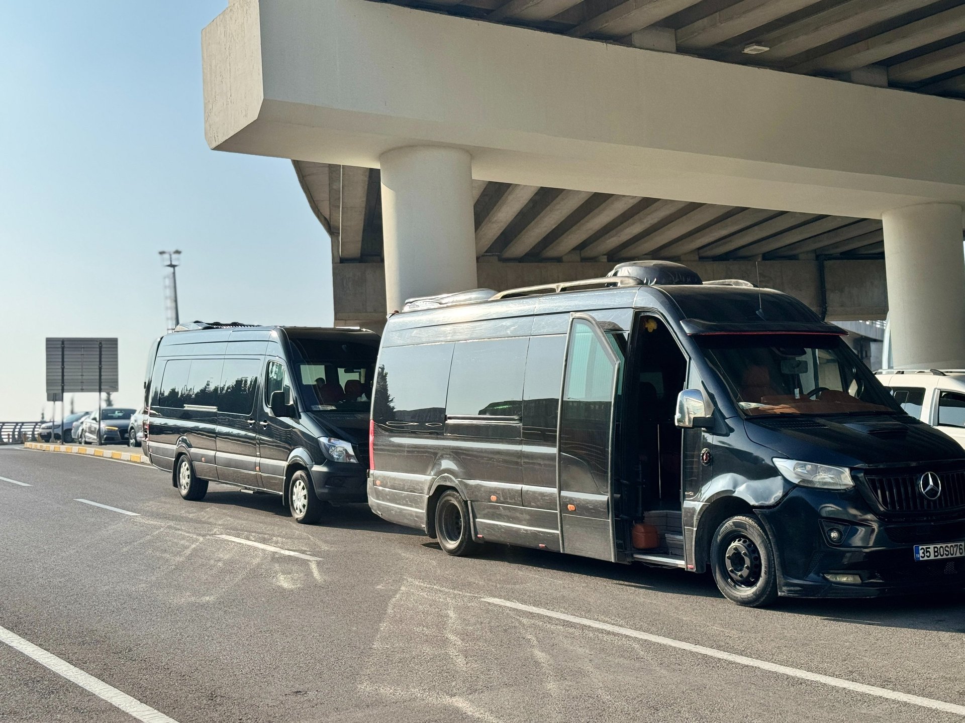 black and brown leather padded tub sofa