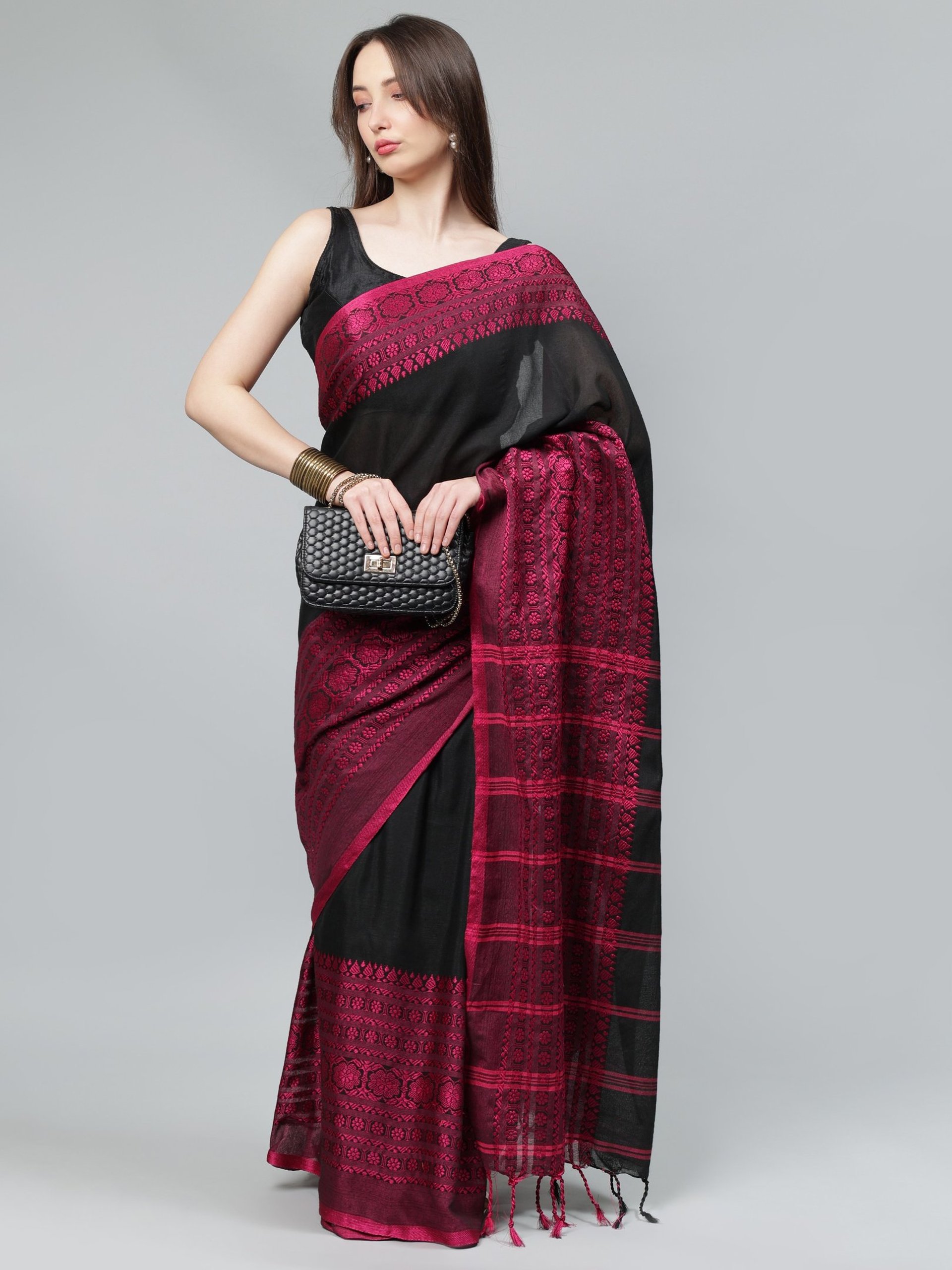 woman holding dried flower