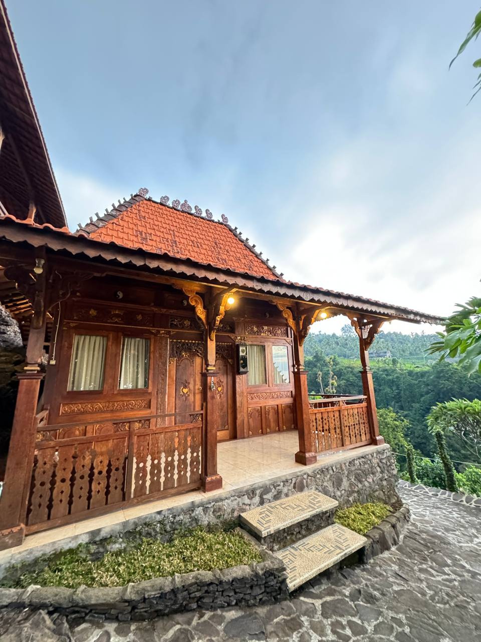 Antique Joglo teak pavilion exterior showcasing traditional Indonesian architecture crafted from reclaimed teak wood
