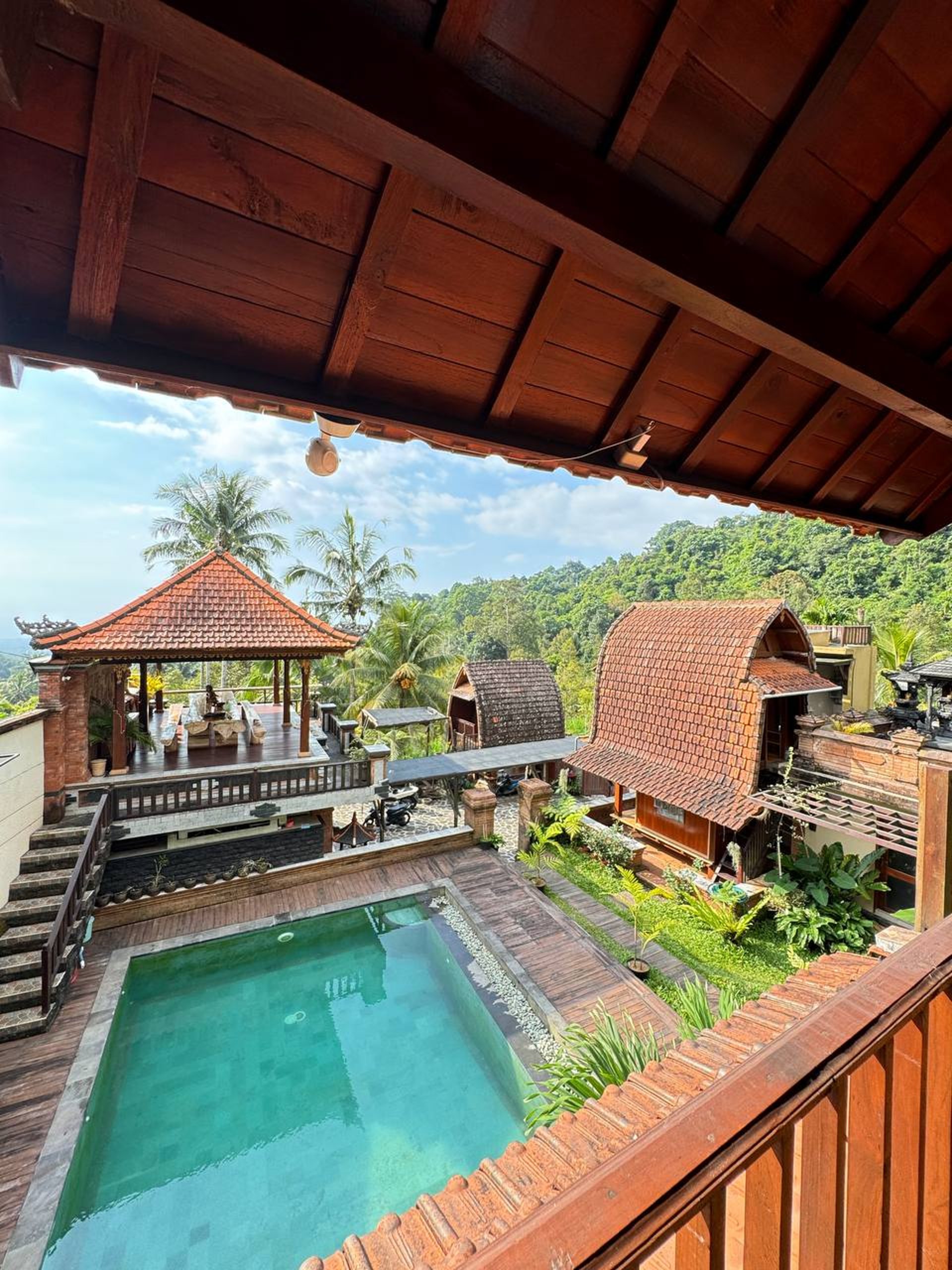 Assembly process of Joglo wooden structure by skilled craftsmen using traditional methods and teak components