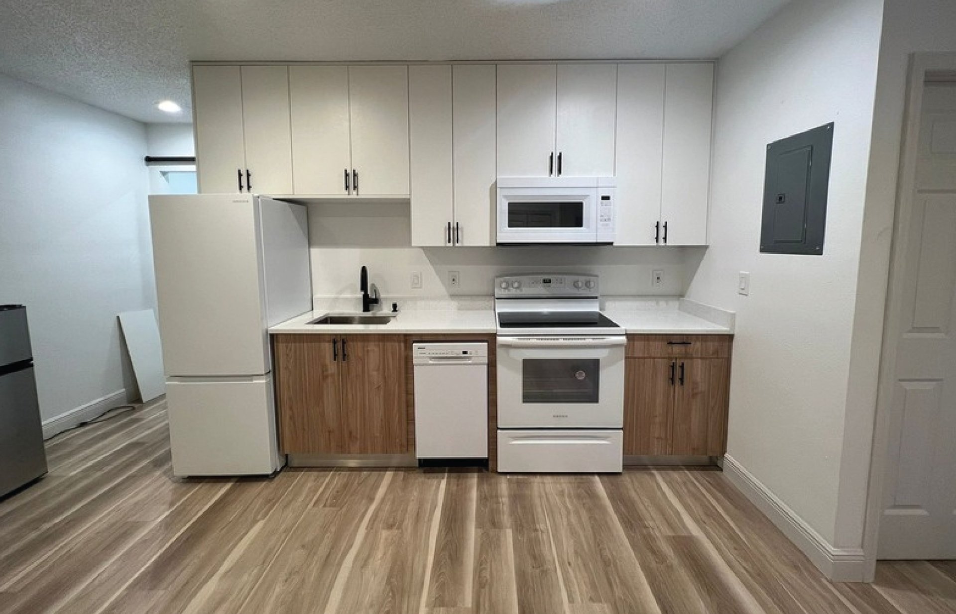 woman wearing yellow long-sleeved dress under white clouds and blue sky during daytime