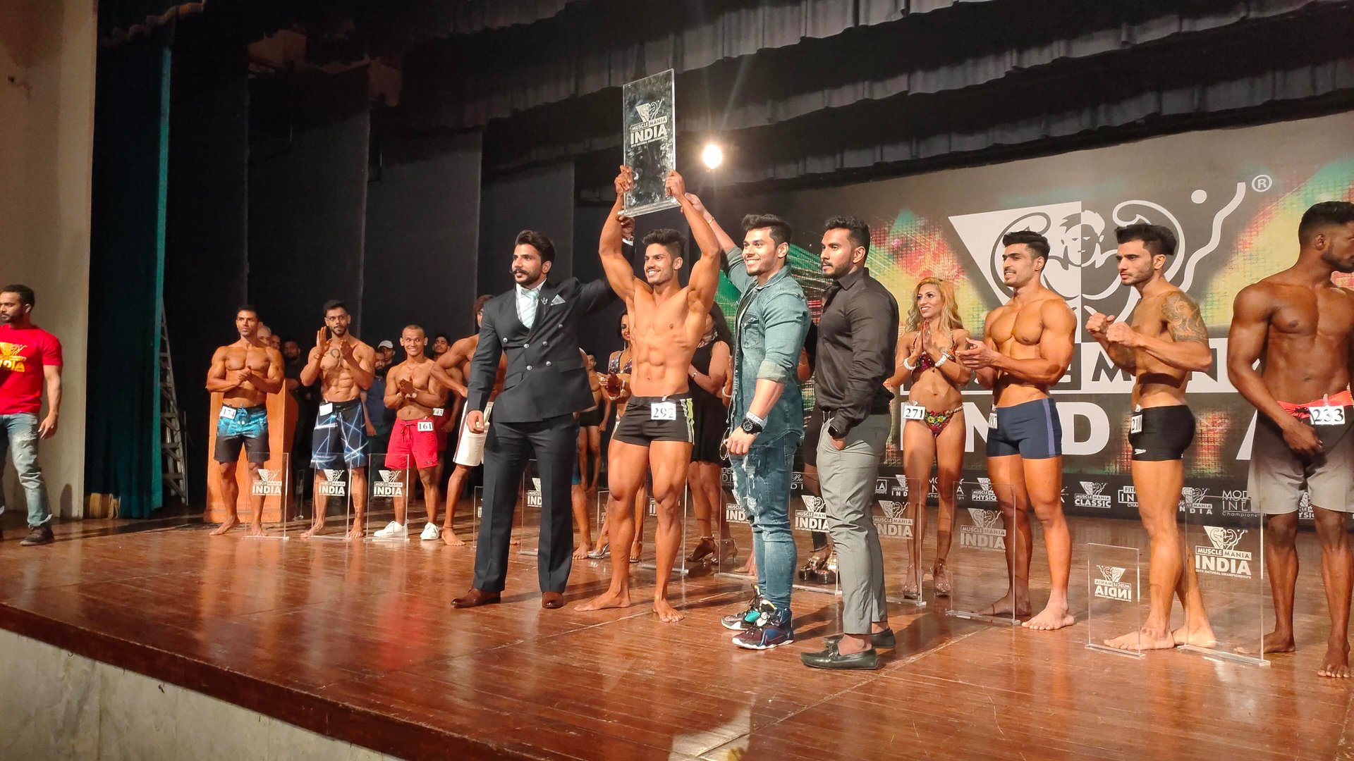 Vipin Raj posing after winning Musclemania Natural championship