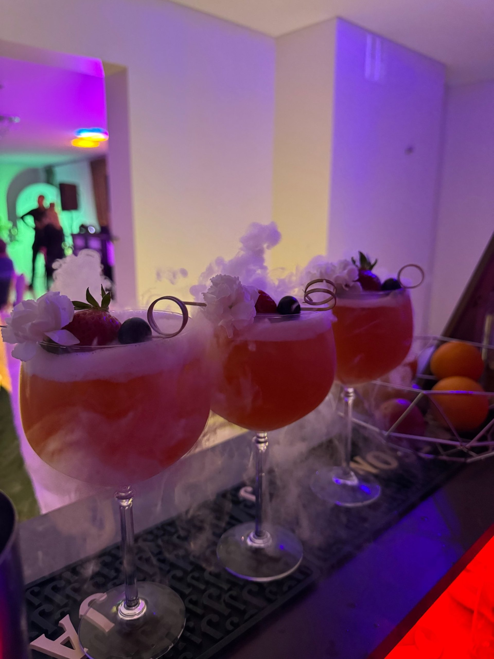 an abstract photo of a curved building with a blue sky in the background