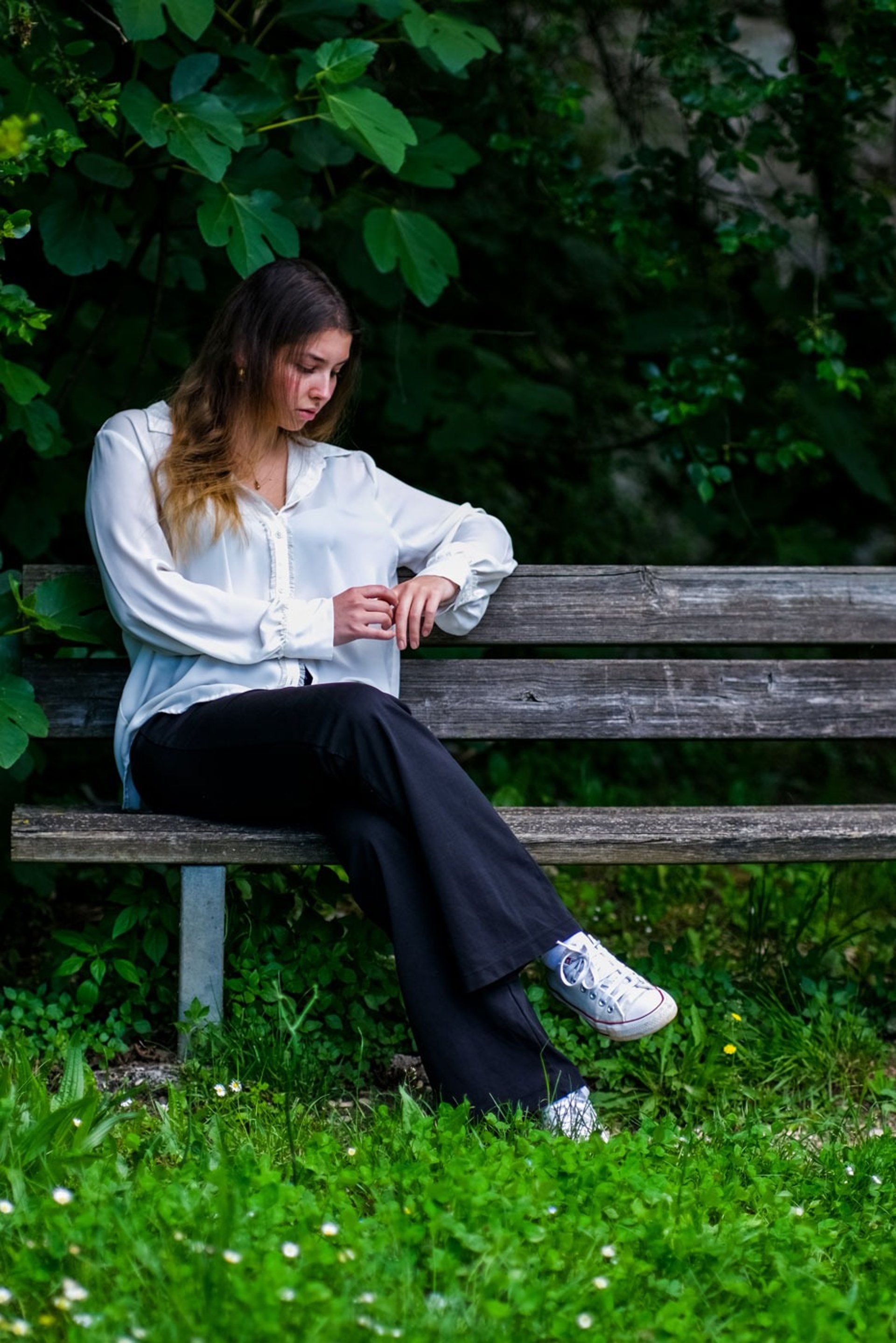 an abstract photo of a curved building with a blue sky in the background