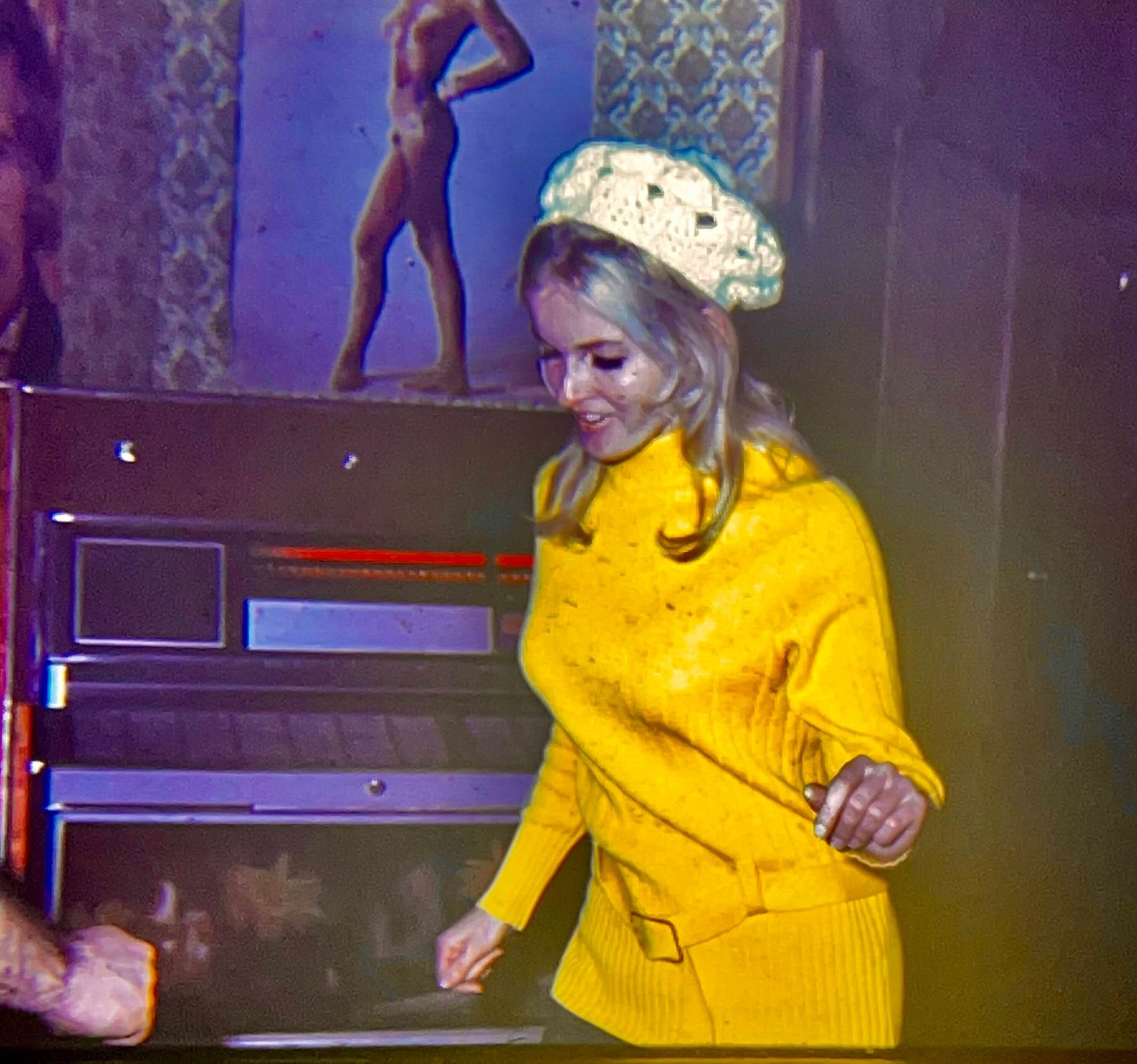 woman wearing yellow long-sleeved dress under white clouds and blue sky during daytime