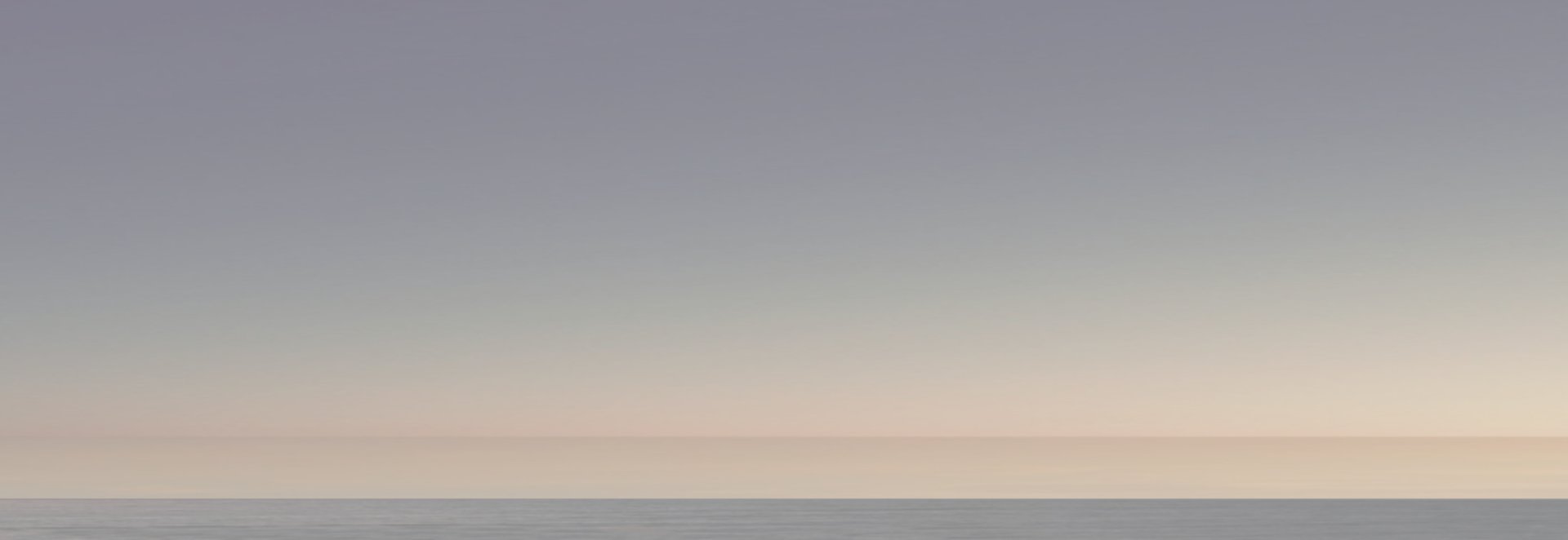 Tranquil silver-toned seascape at dawn, symbolizing reflection and hope in Never is as Close as Tomorrow by JG Arculus.