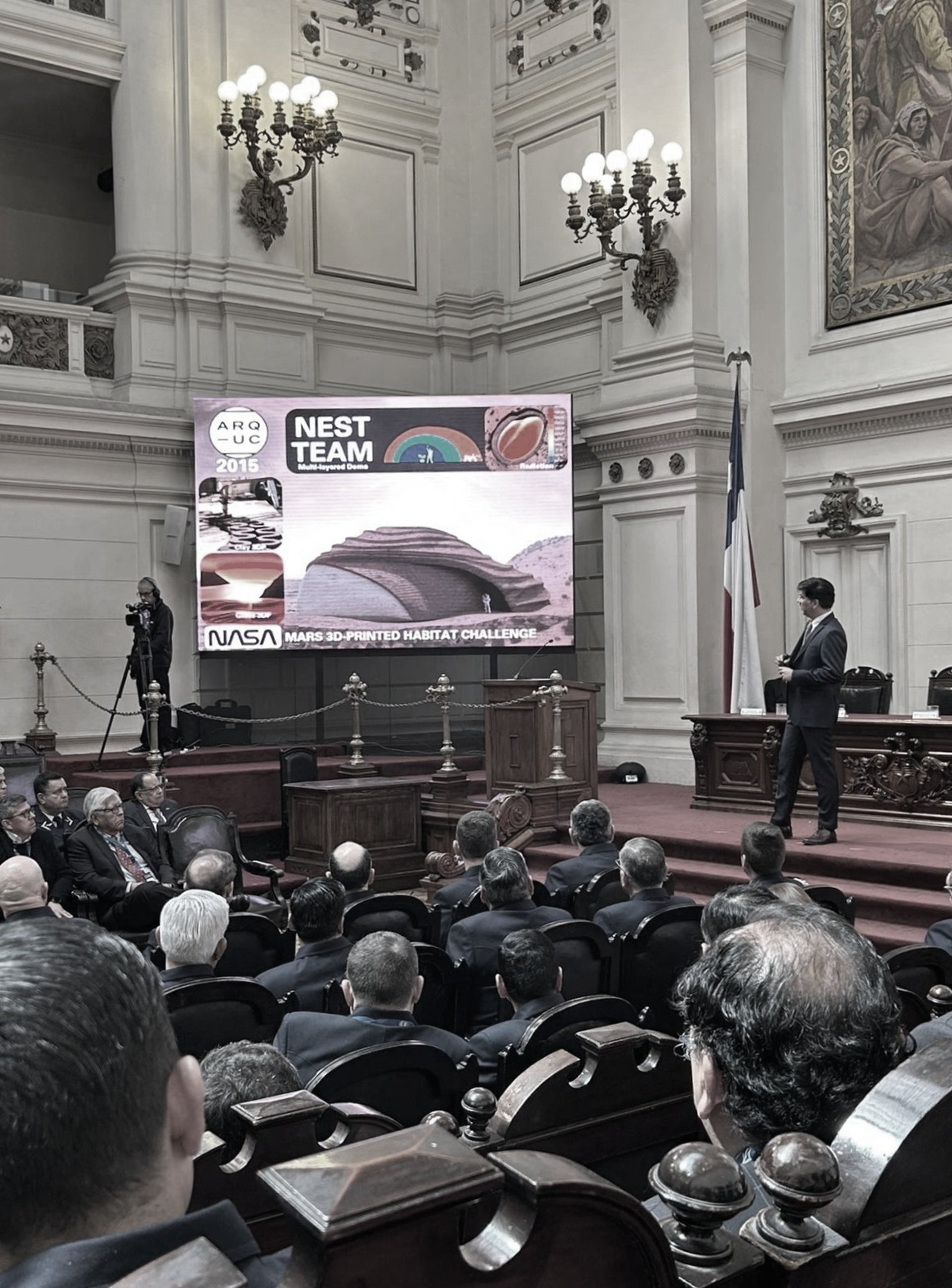 an abstract photo of a curved building with a blue sky in the background
