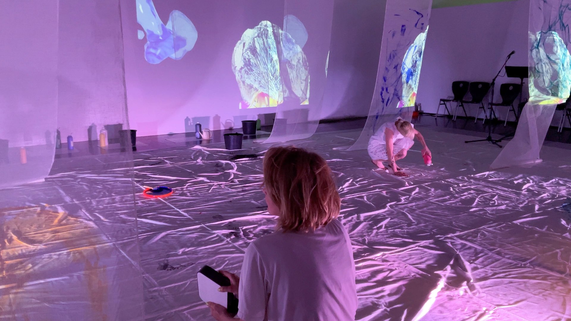 an abstract photo of a curved building with a blue sky in the background