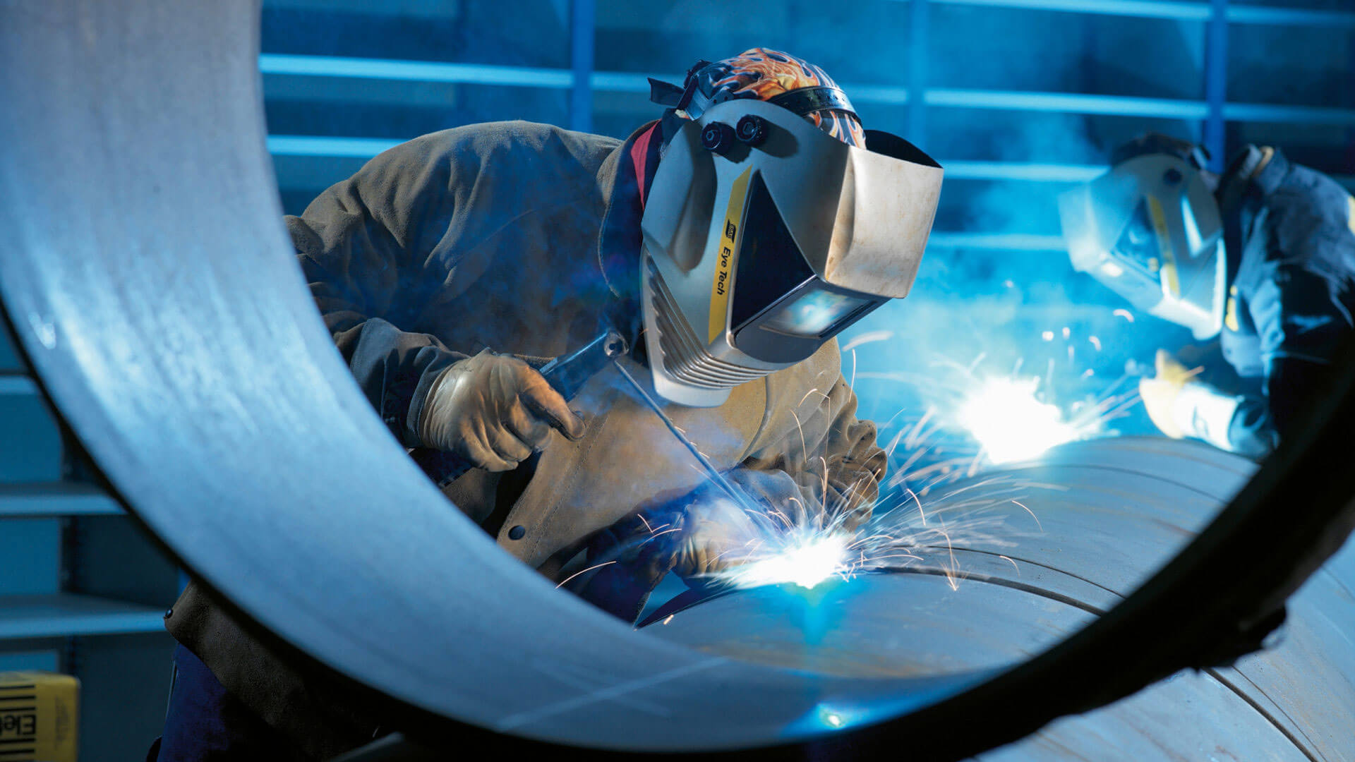 man holding gray steel frame