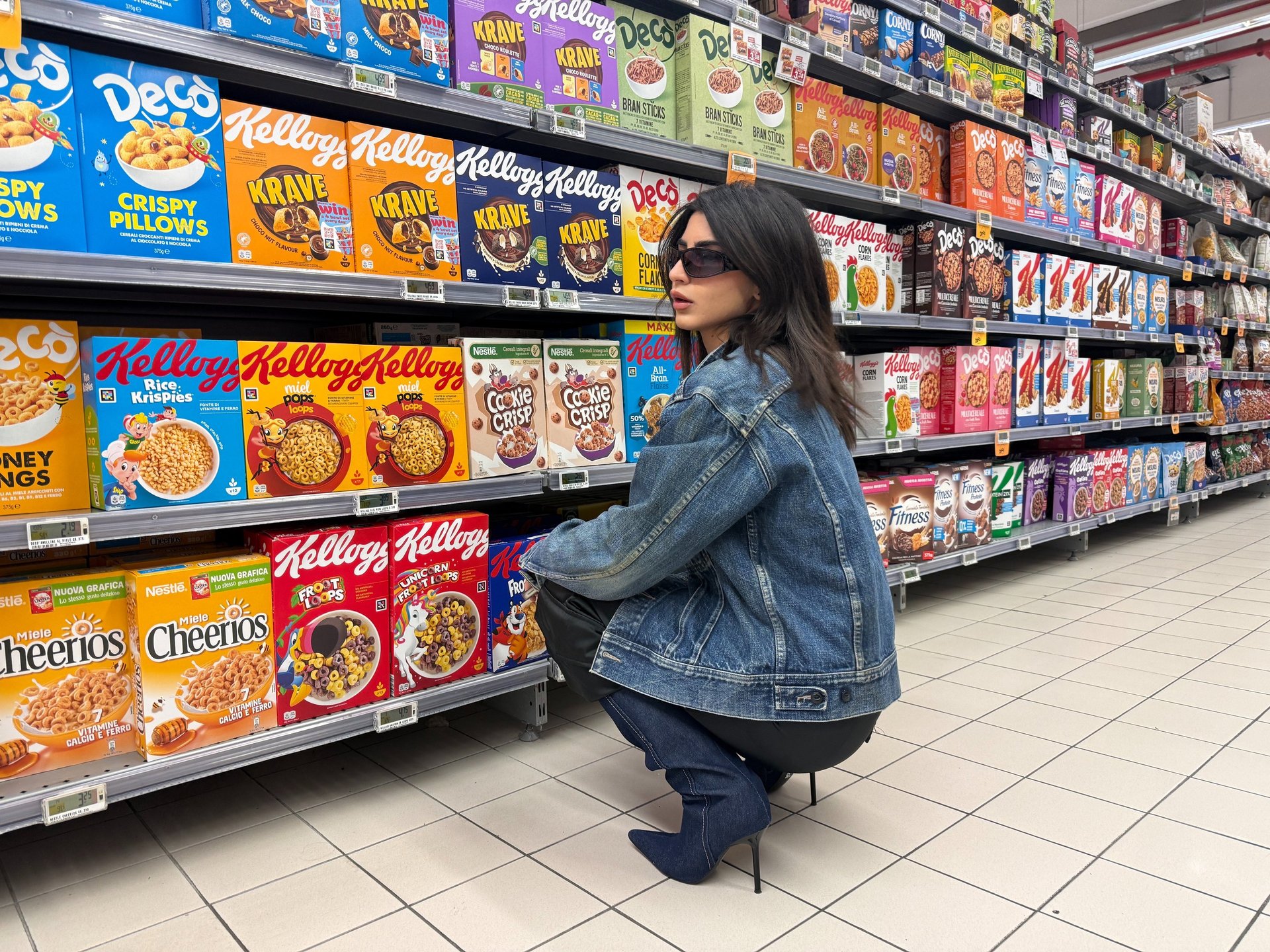 an abstract photo of a curved building with a blue sky in the background
