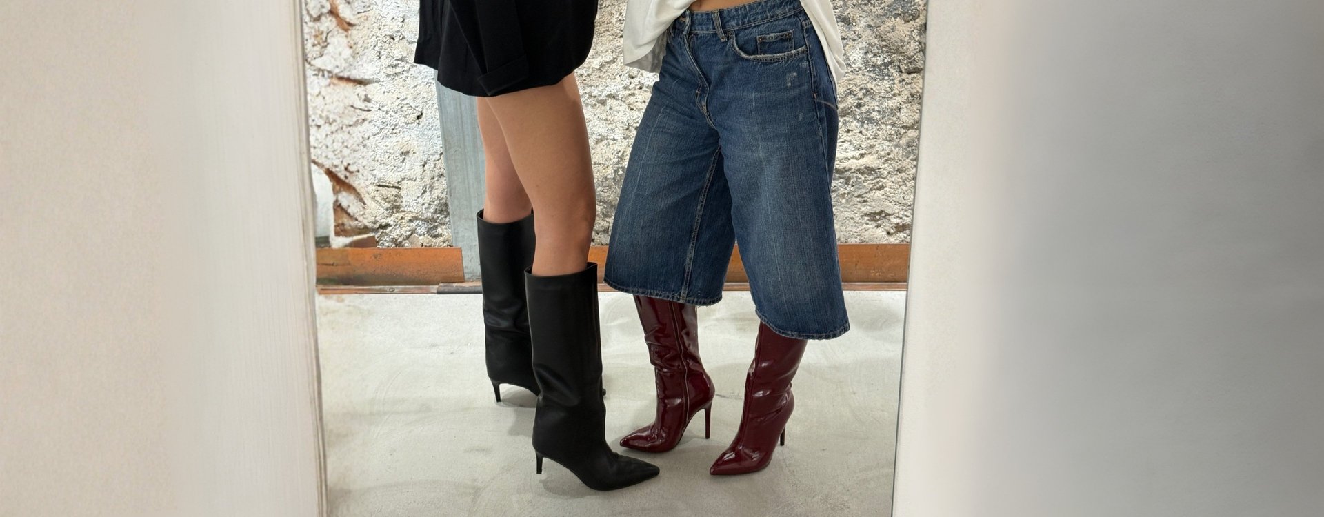 an abstract photo of a curved building with a blue sky in the background