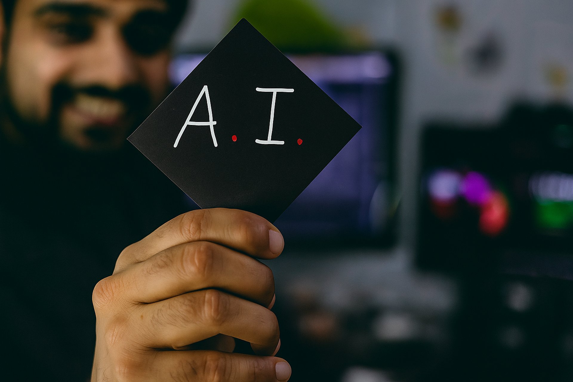 a group of hands reaching for a cell phone