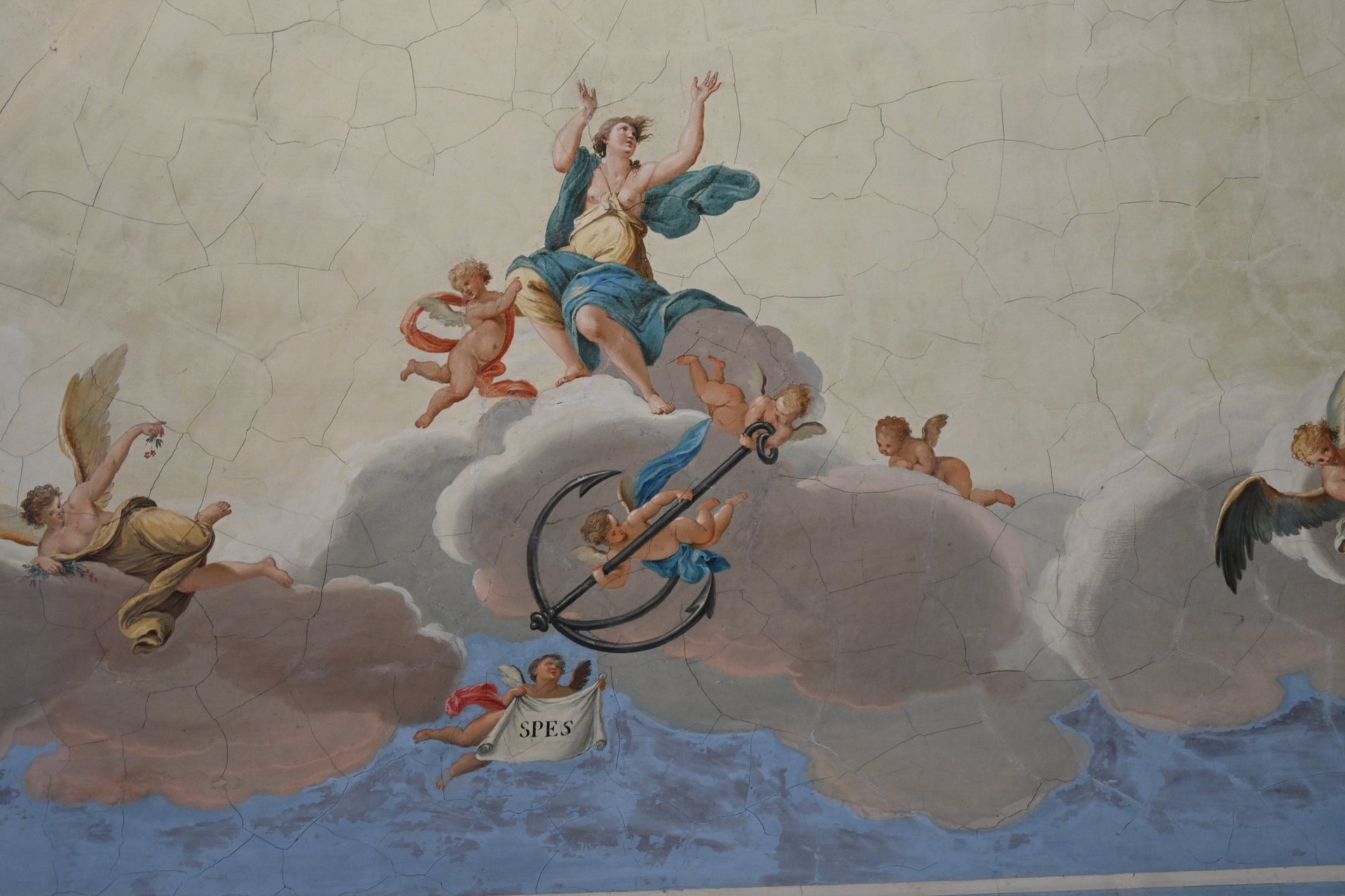 an abstract photo of a curved building with a blue sky in the background