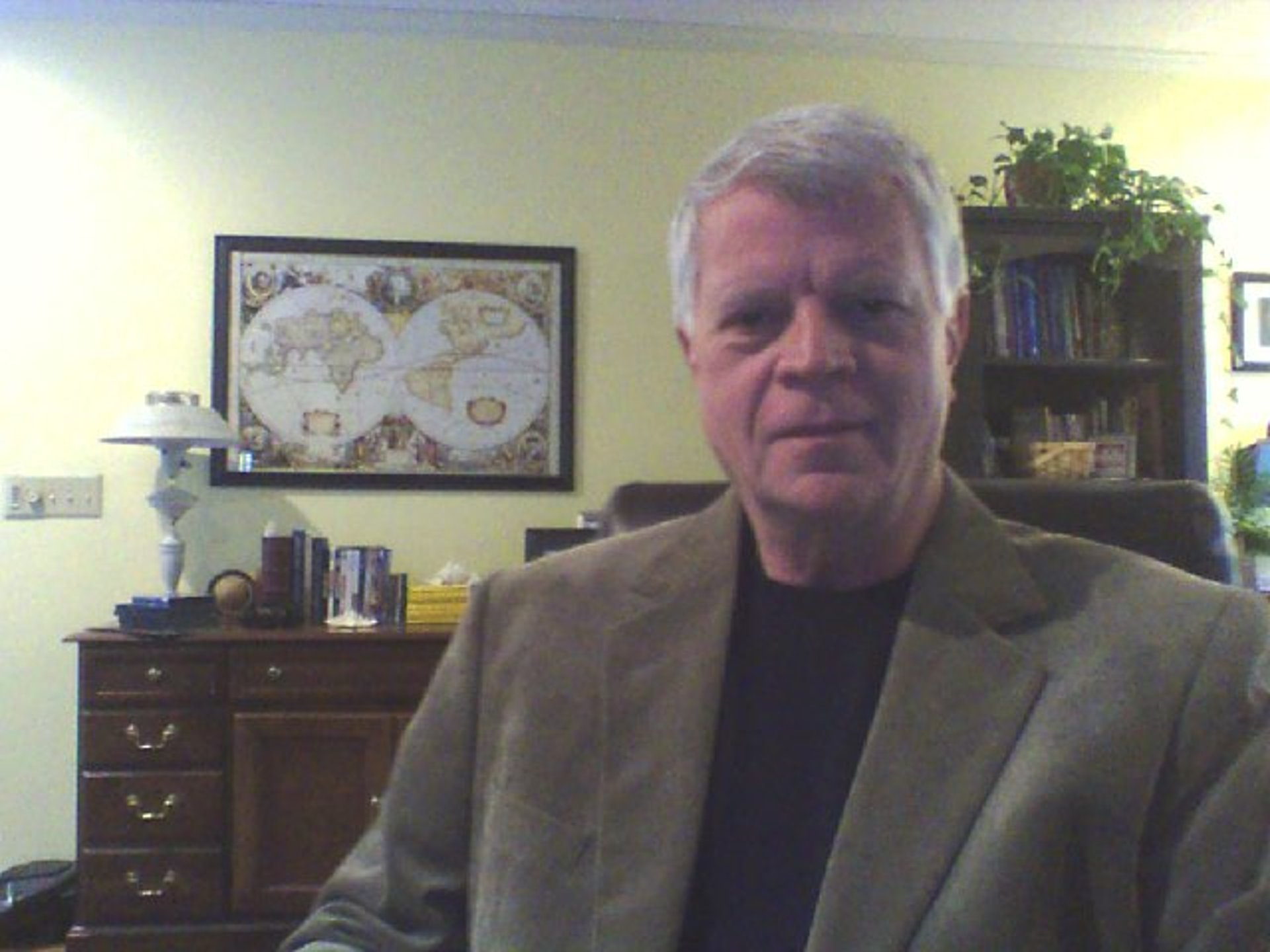 black and brown leather padded tub sofa