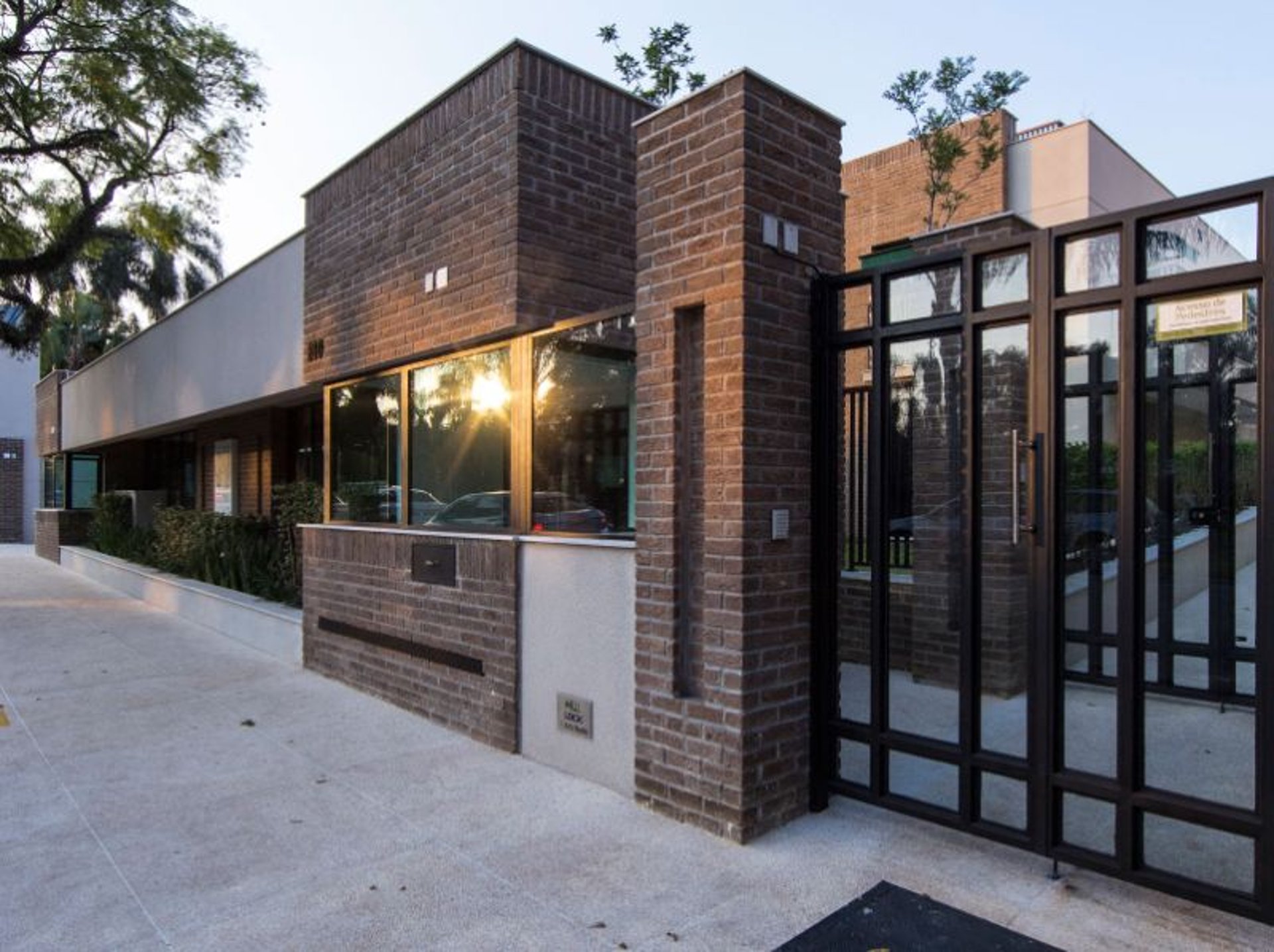 black and brown leather padded tub sofa