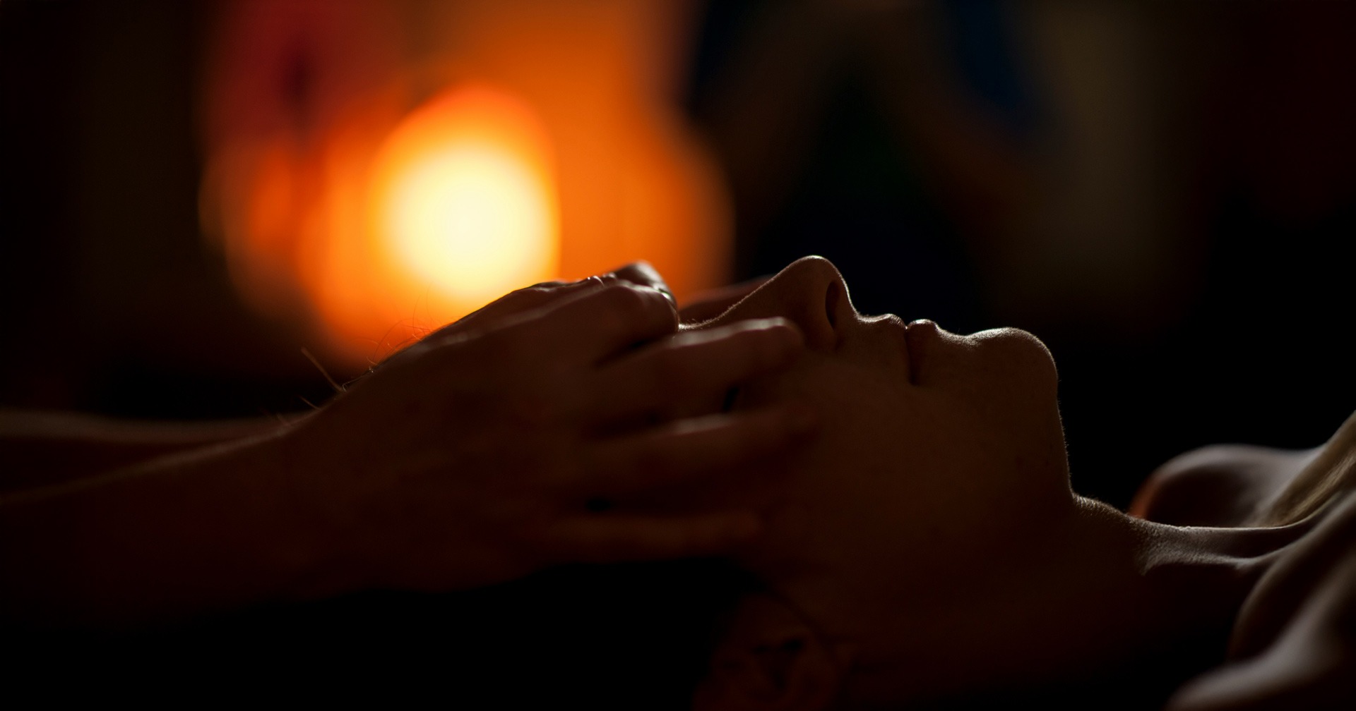 an abstract photo of a curved building with a blue sky in the background