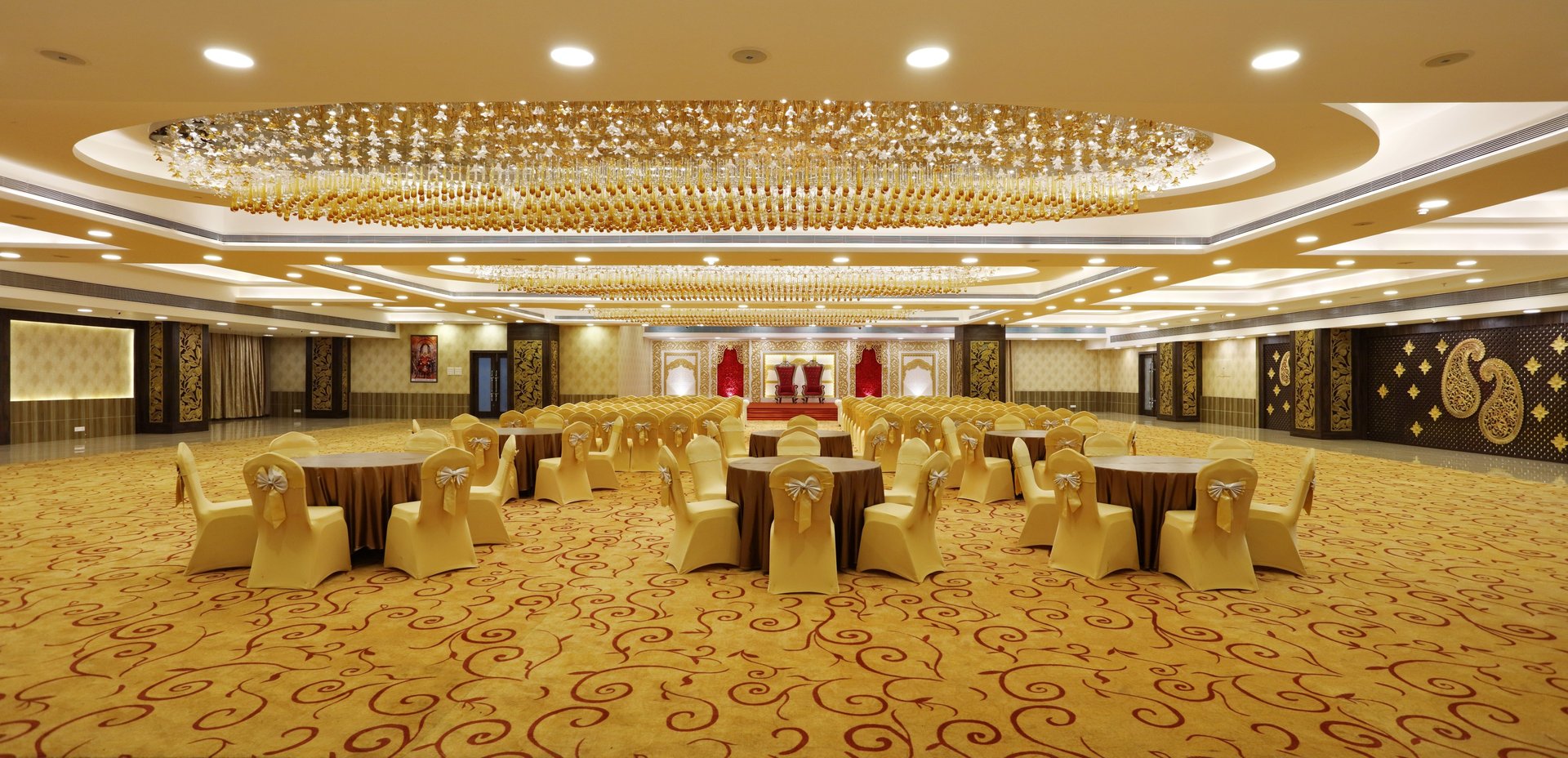 an abstract photo of a curved building with a blue sky in the background