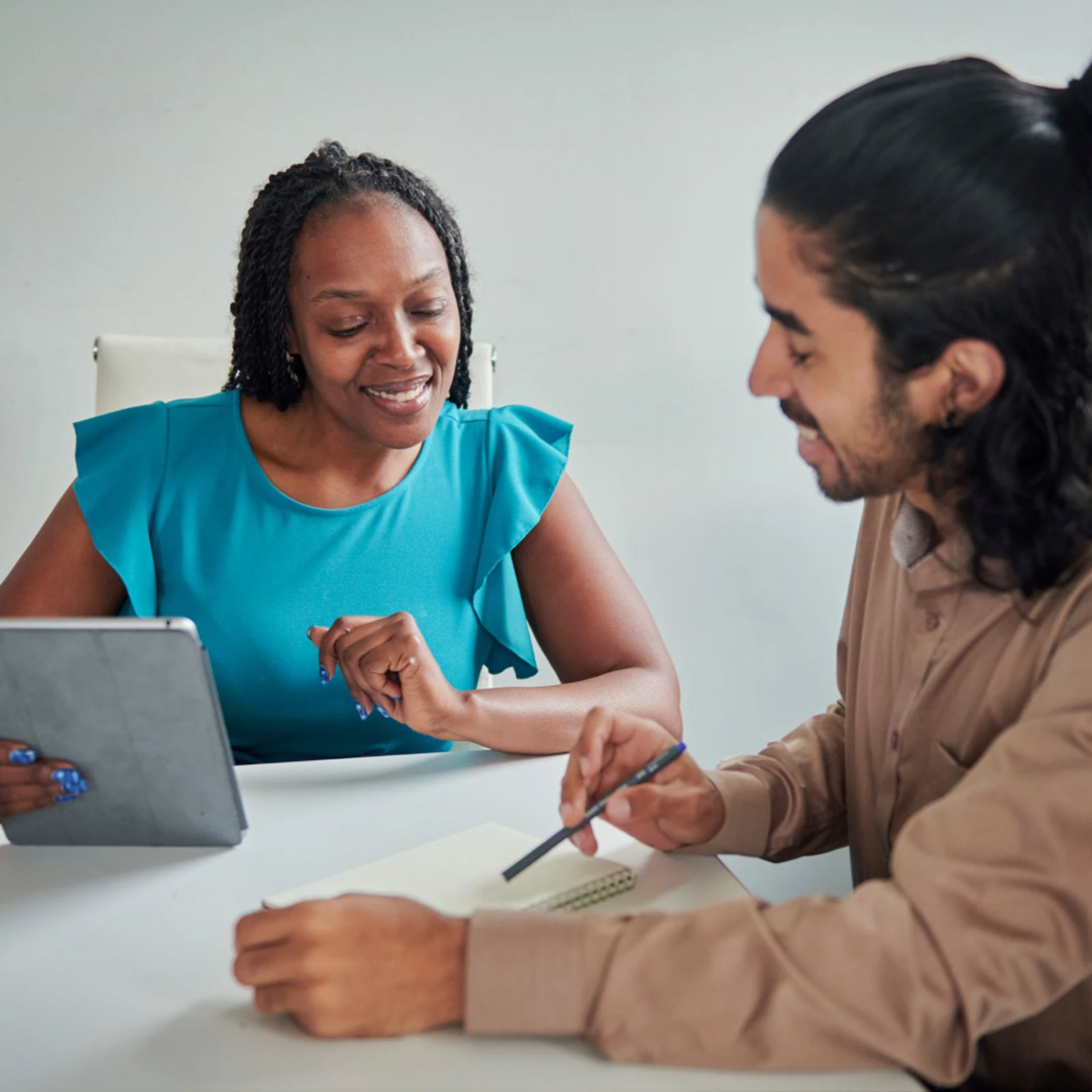 a doctor checking a patient's blood pressure