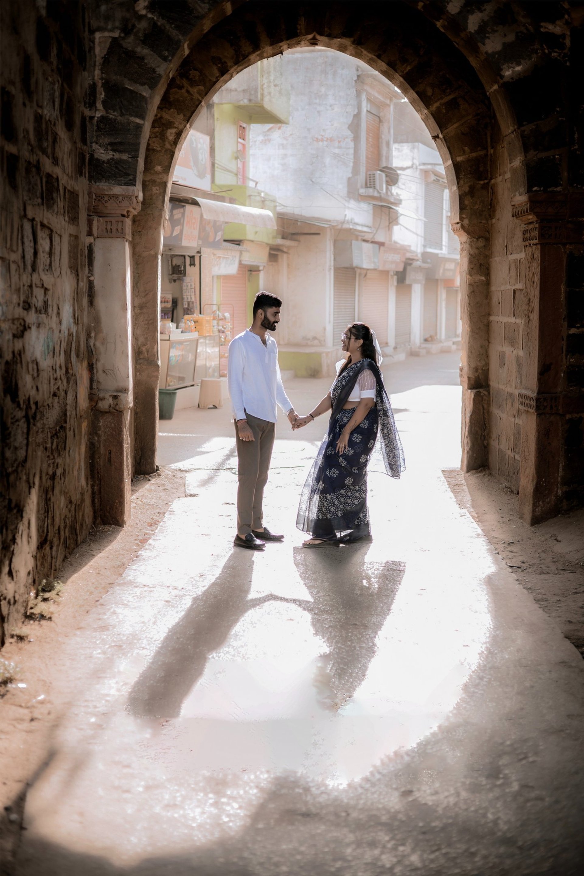 an abstract photo of a curved building with a blue sky in the background