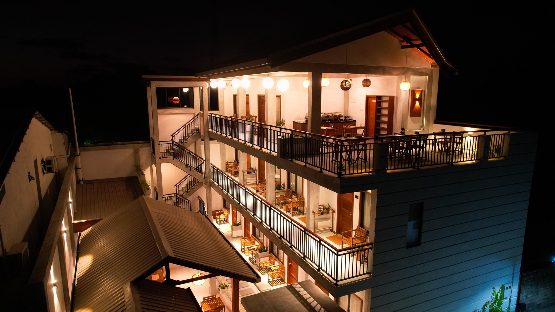an abstract photo of a curved building with a blue sky in the background
