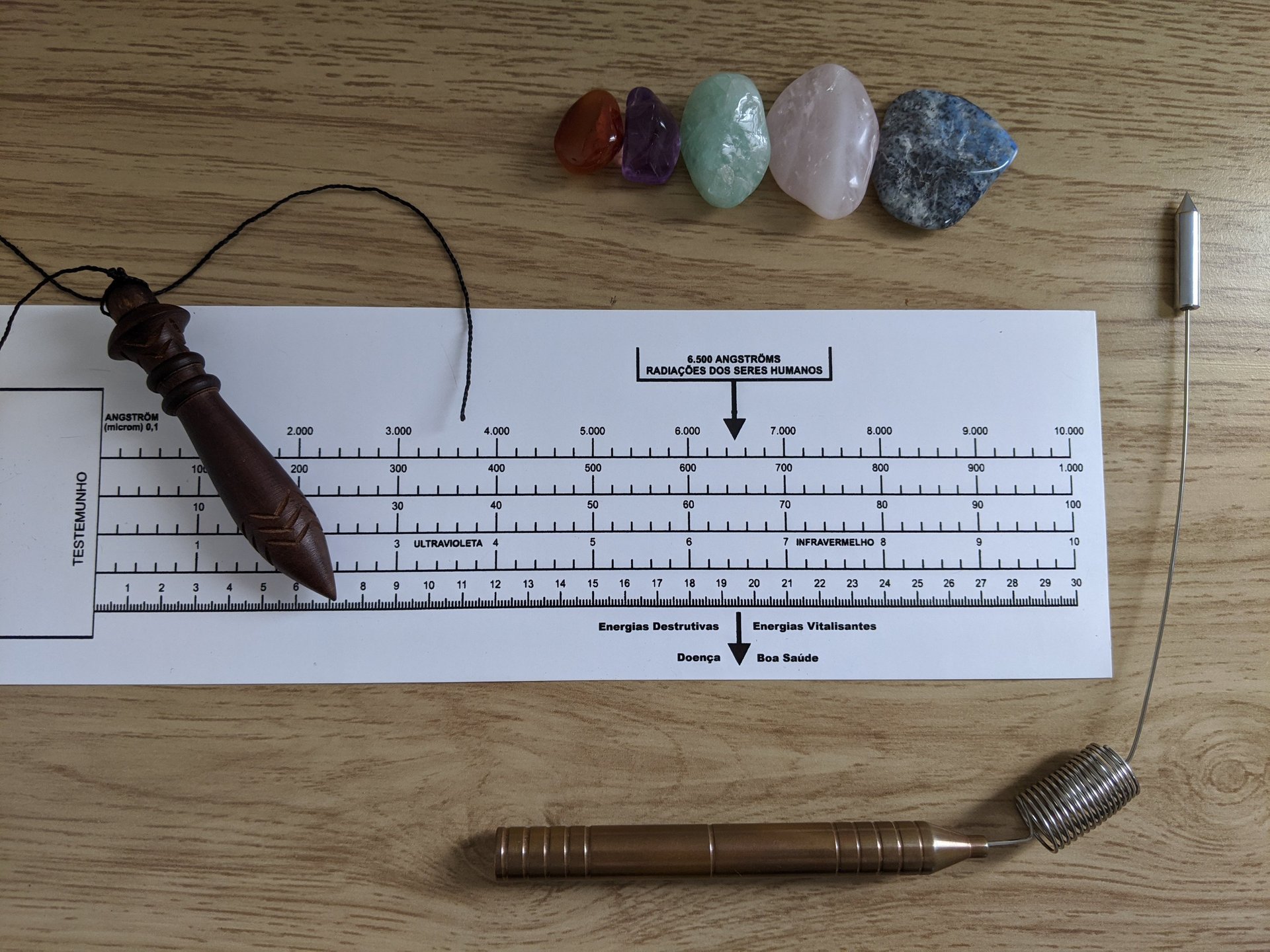 the sun is shining through the foggy trees