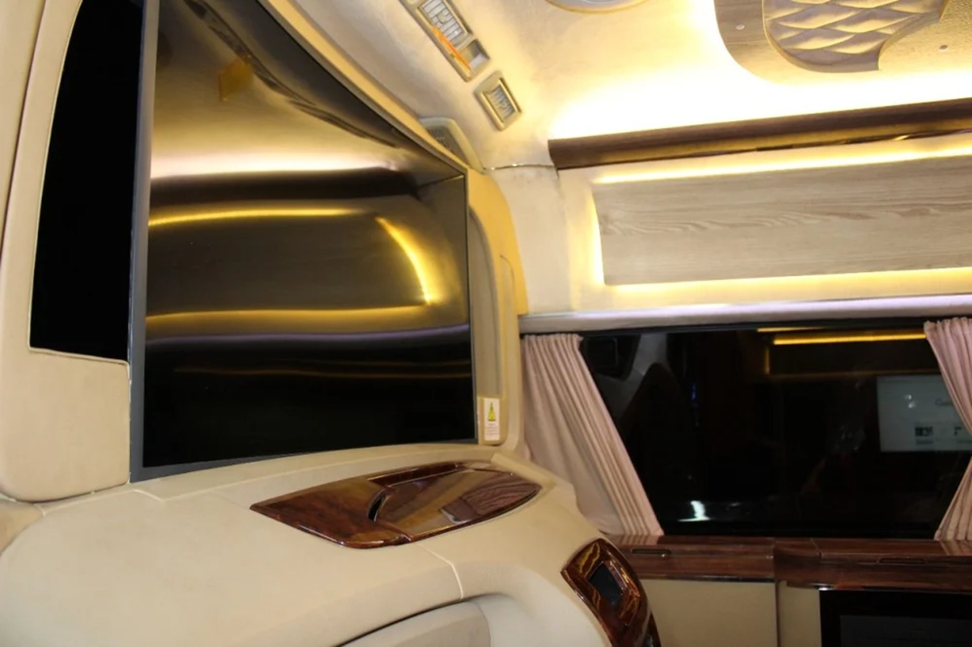 black and brown leather padded tub sofa