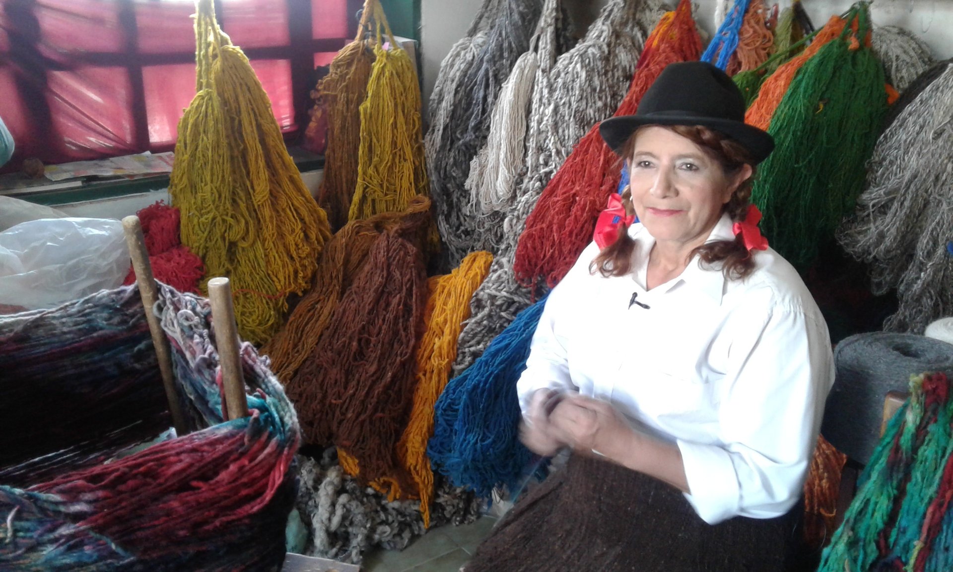 woman holding dried flower