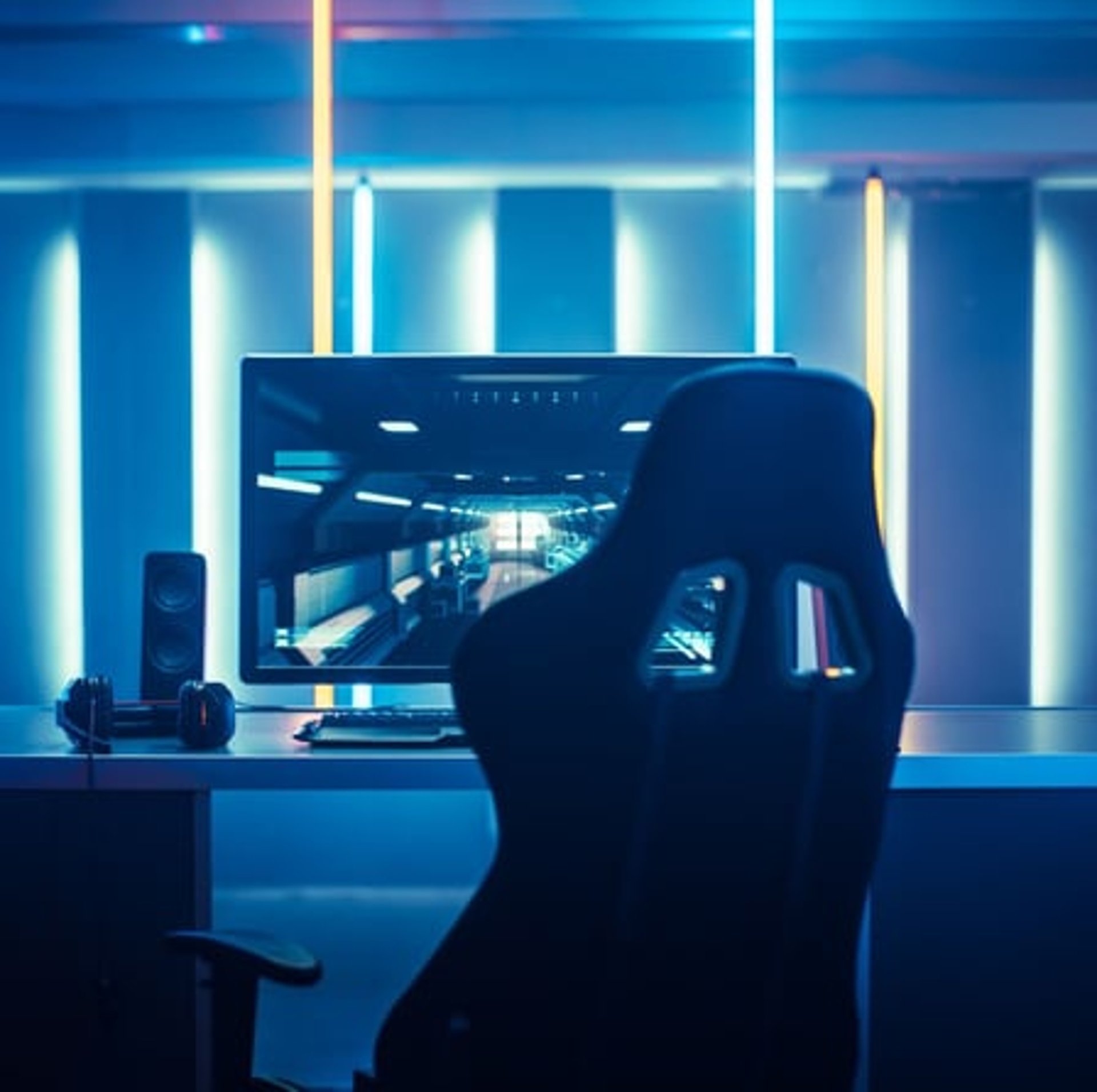 an abstract photo of a curved building with a blue sky in the background