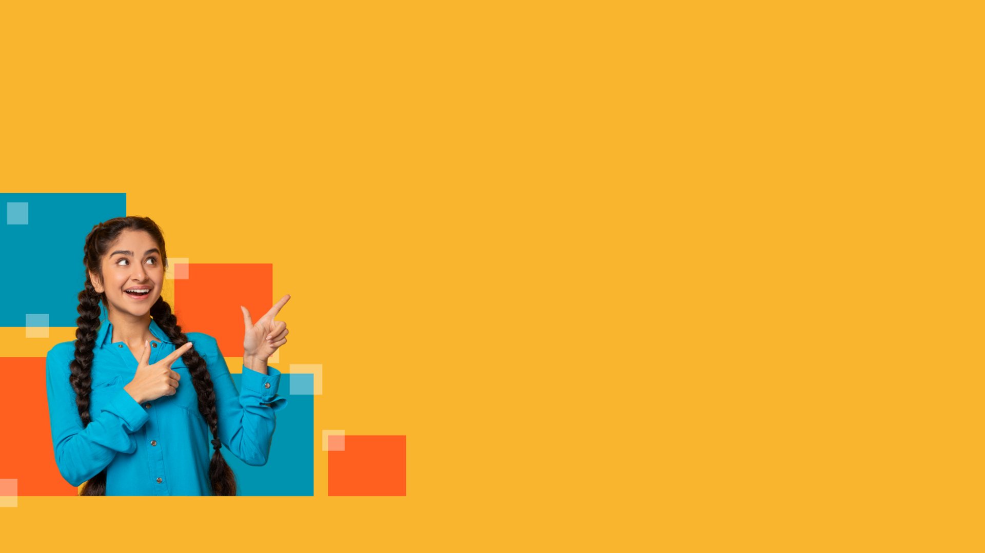 A street lined with parked cars next to tall mountains