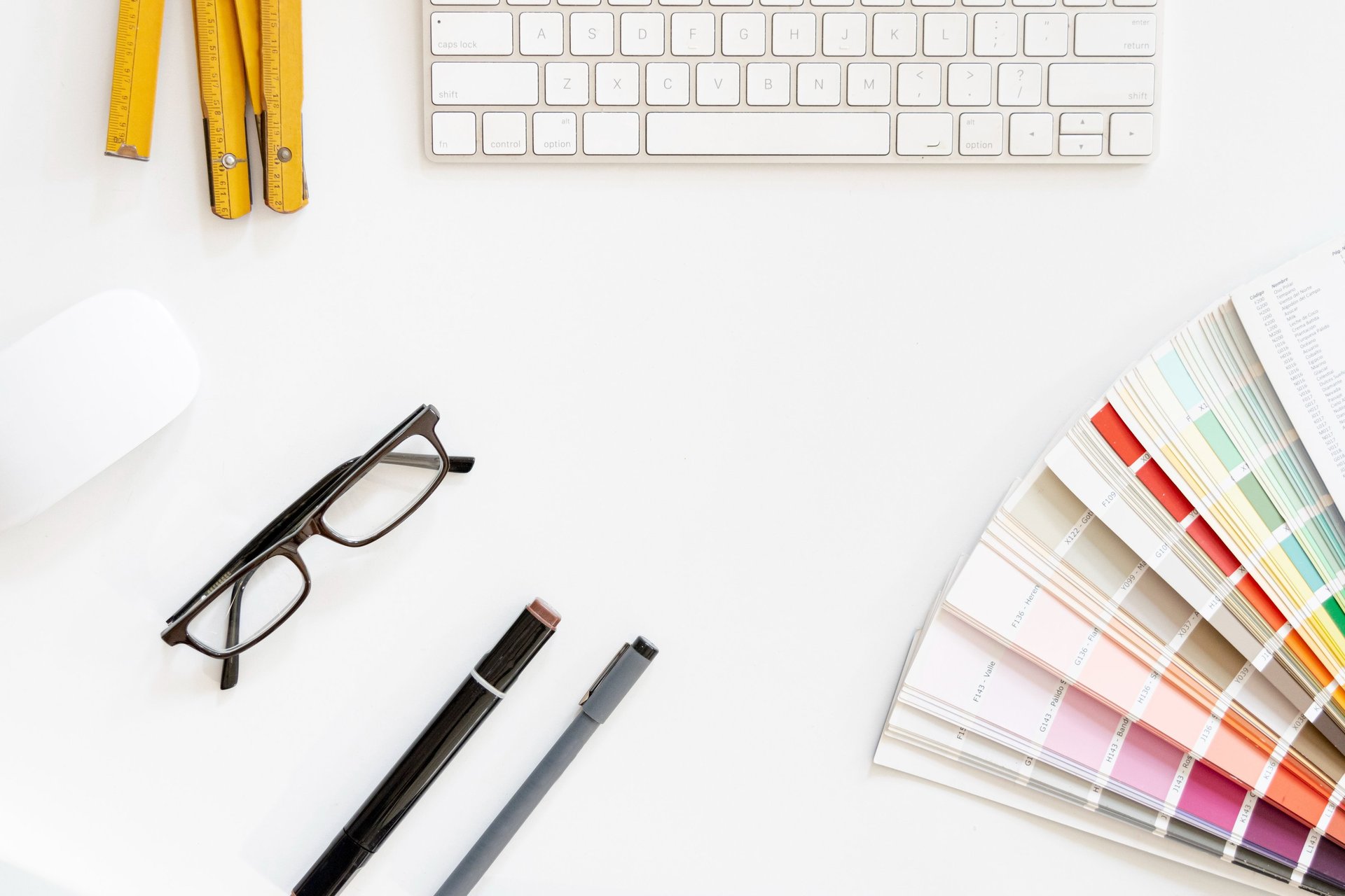 an abstract photo of a curved building with a blue sky in the background