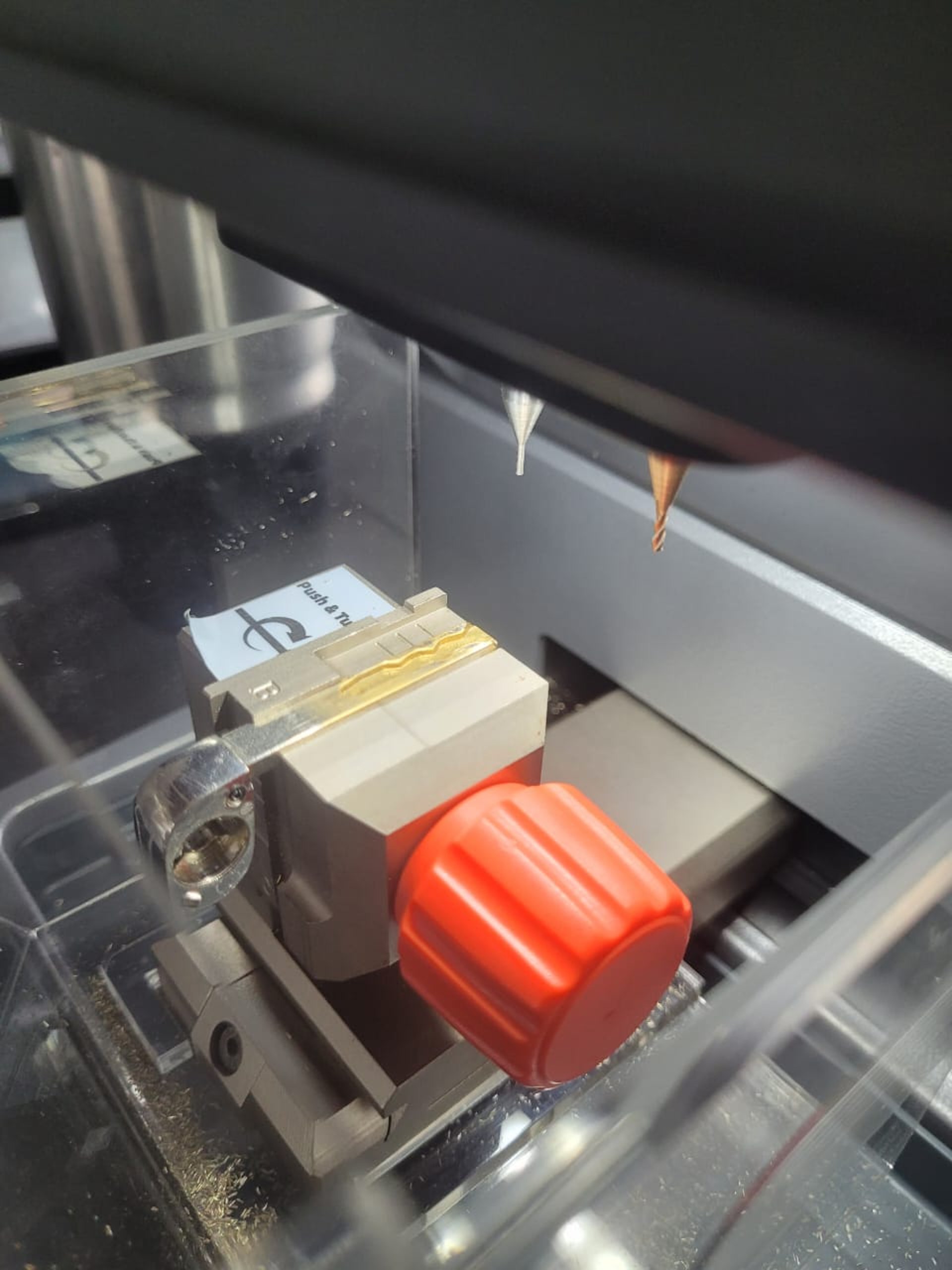 A parking garage filled with lots of parked cars