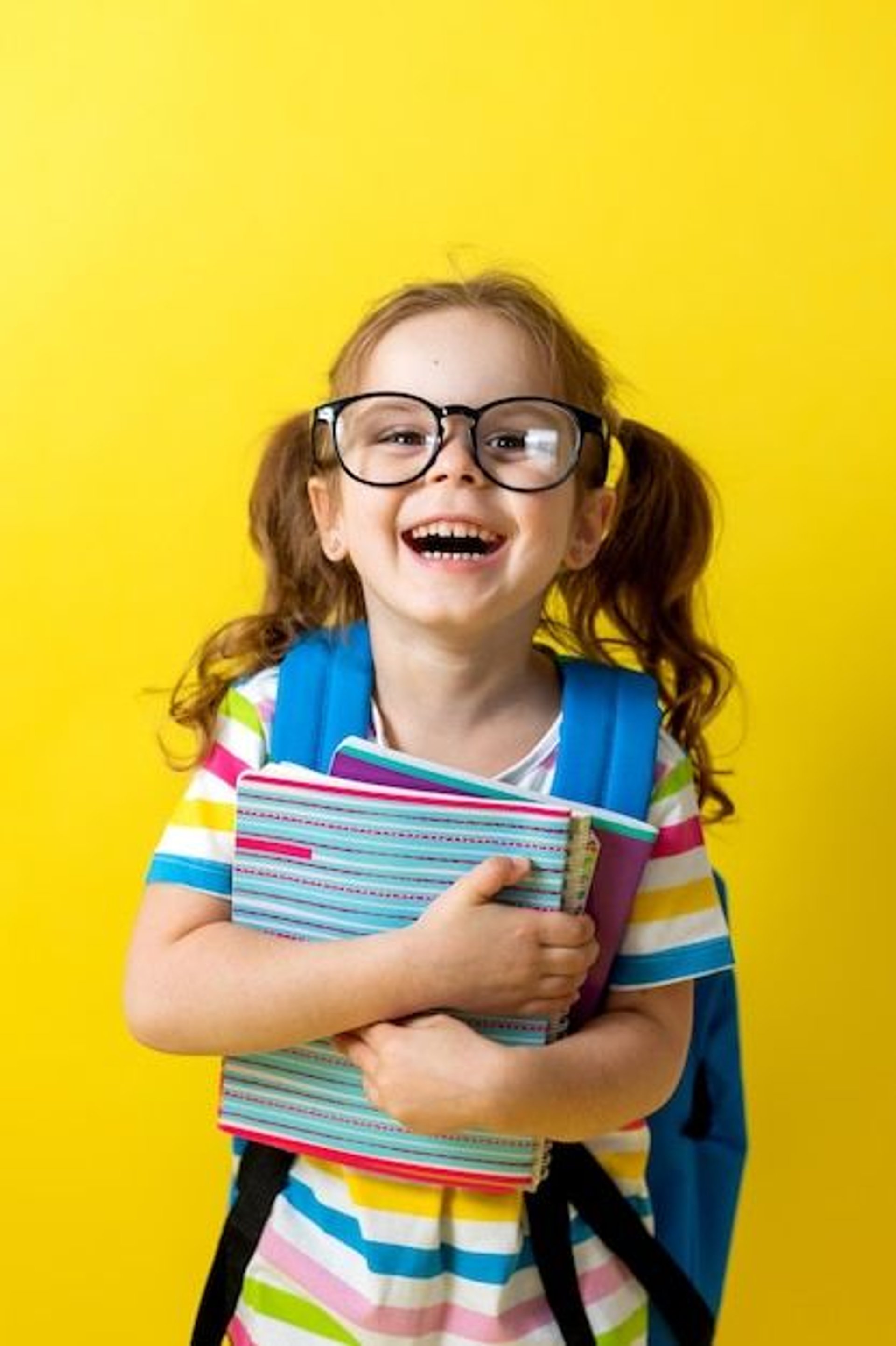 an abstract photo of a curved building with a blue sky in the background