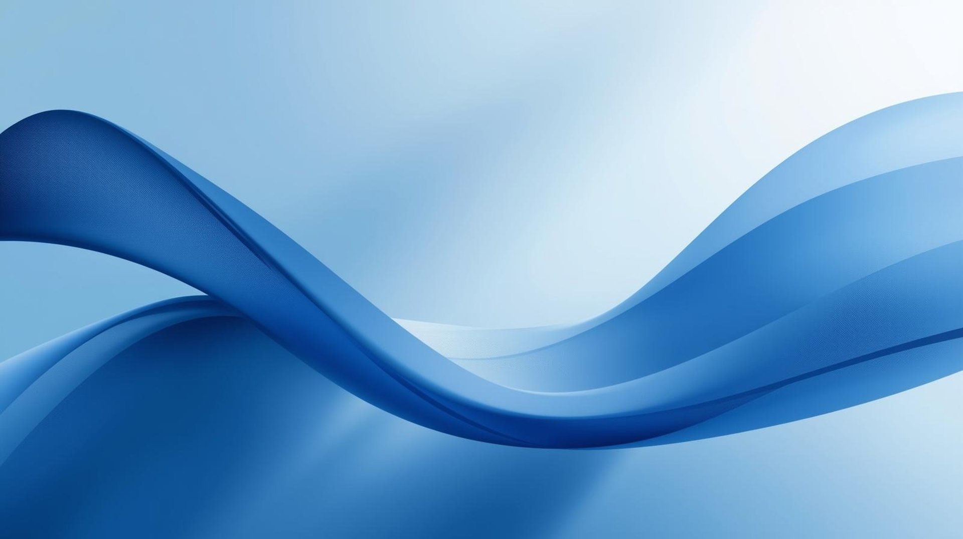 an abstract photo of a curved building with a blue sky in the background